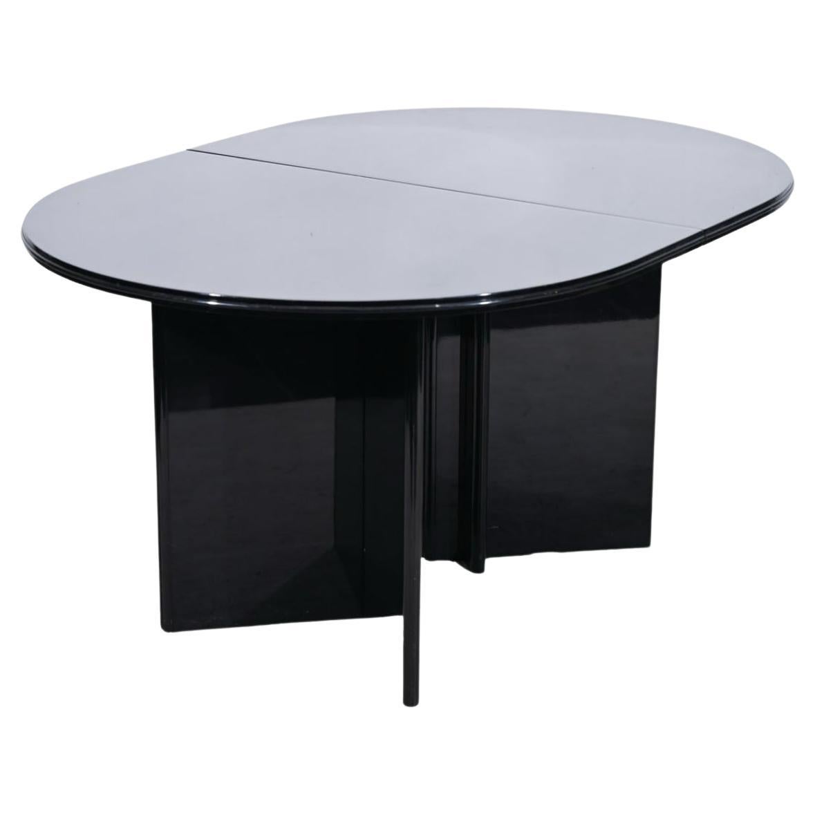 Wood Post Modern Black Lacquered Double Pedestal Oval Dining Table with Leaf For Sale