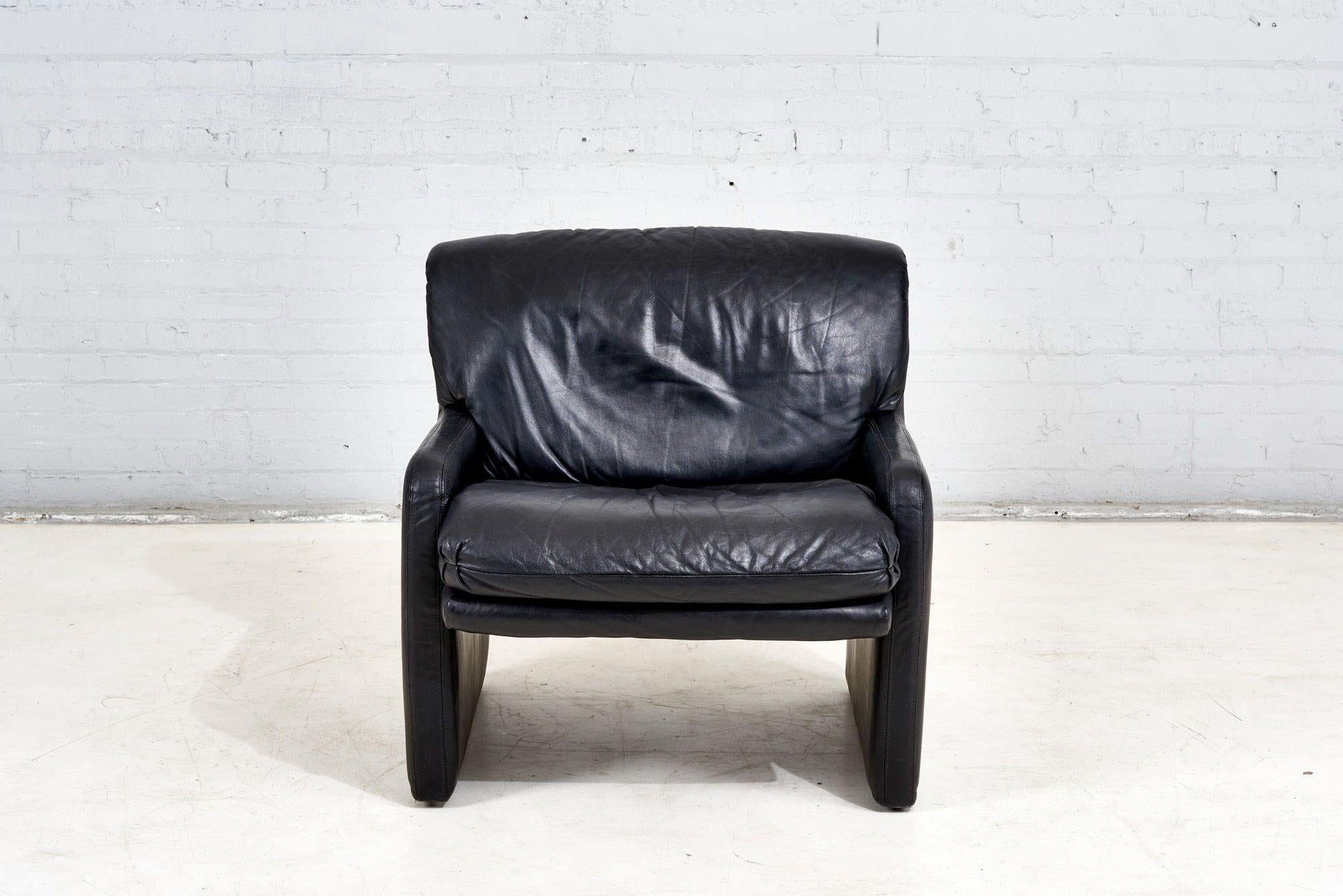 Post modern black leather lounge chair, 1980. Is the style of De Sede. Original leather.