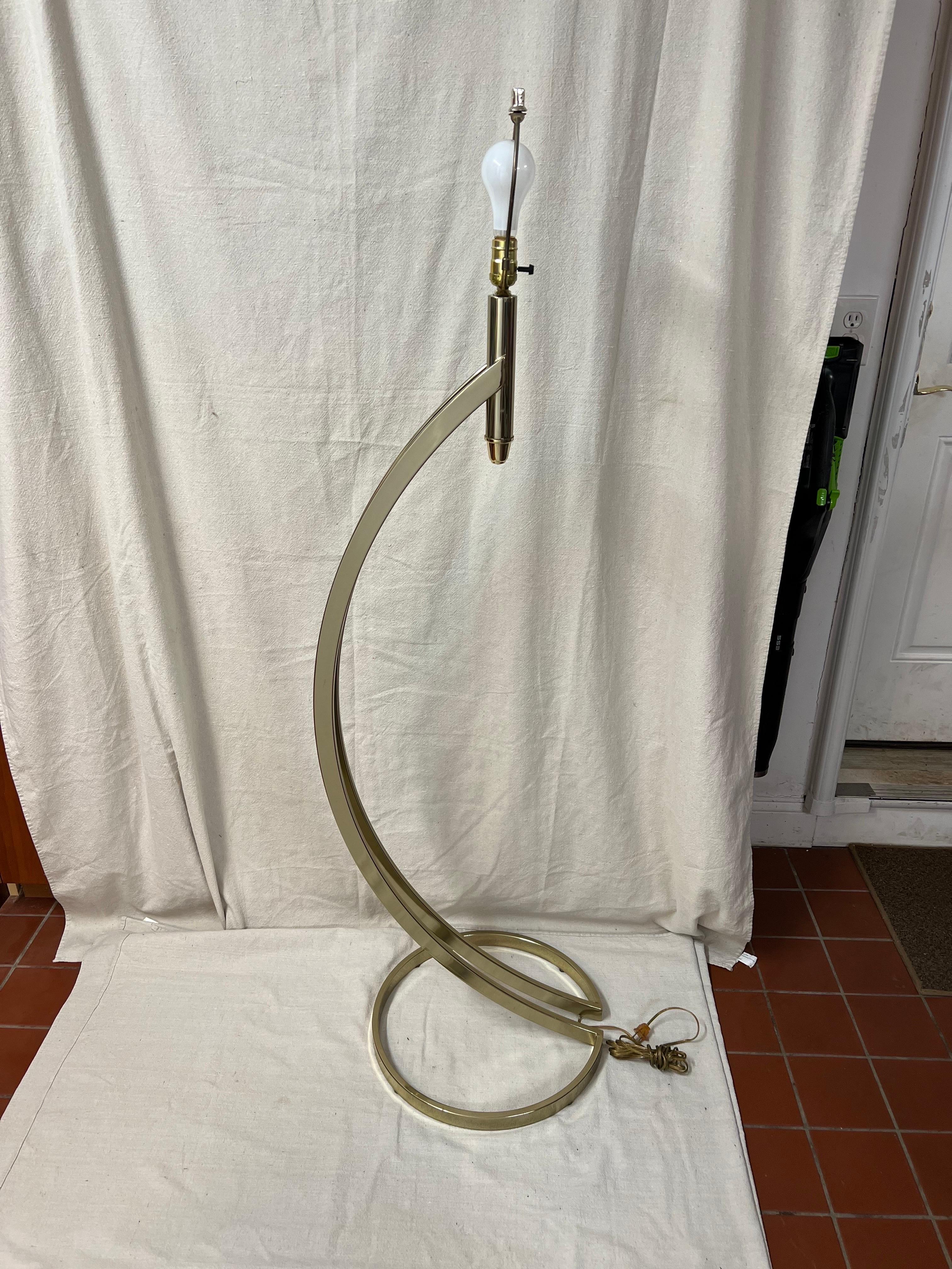Post Modern Brass Floor Lamp. Authentic midcentury to Post modern style. This floor lamp could also go with Art Deco styles. Great reading lamp. Non adjustable. No lamp shade