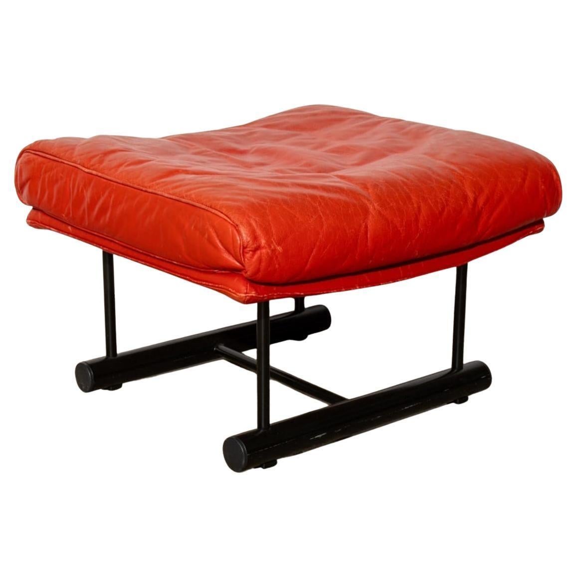 Post modern bright red leather adjustable lounge chair with ottoman by Rolf Benz Germany for Cy Mann. Red Leather Covered Swivel Armchair and Ottoman with wood frames painted in the black lacquer. Designers Collections Cy Mann Designs New York, New