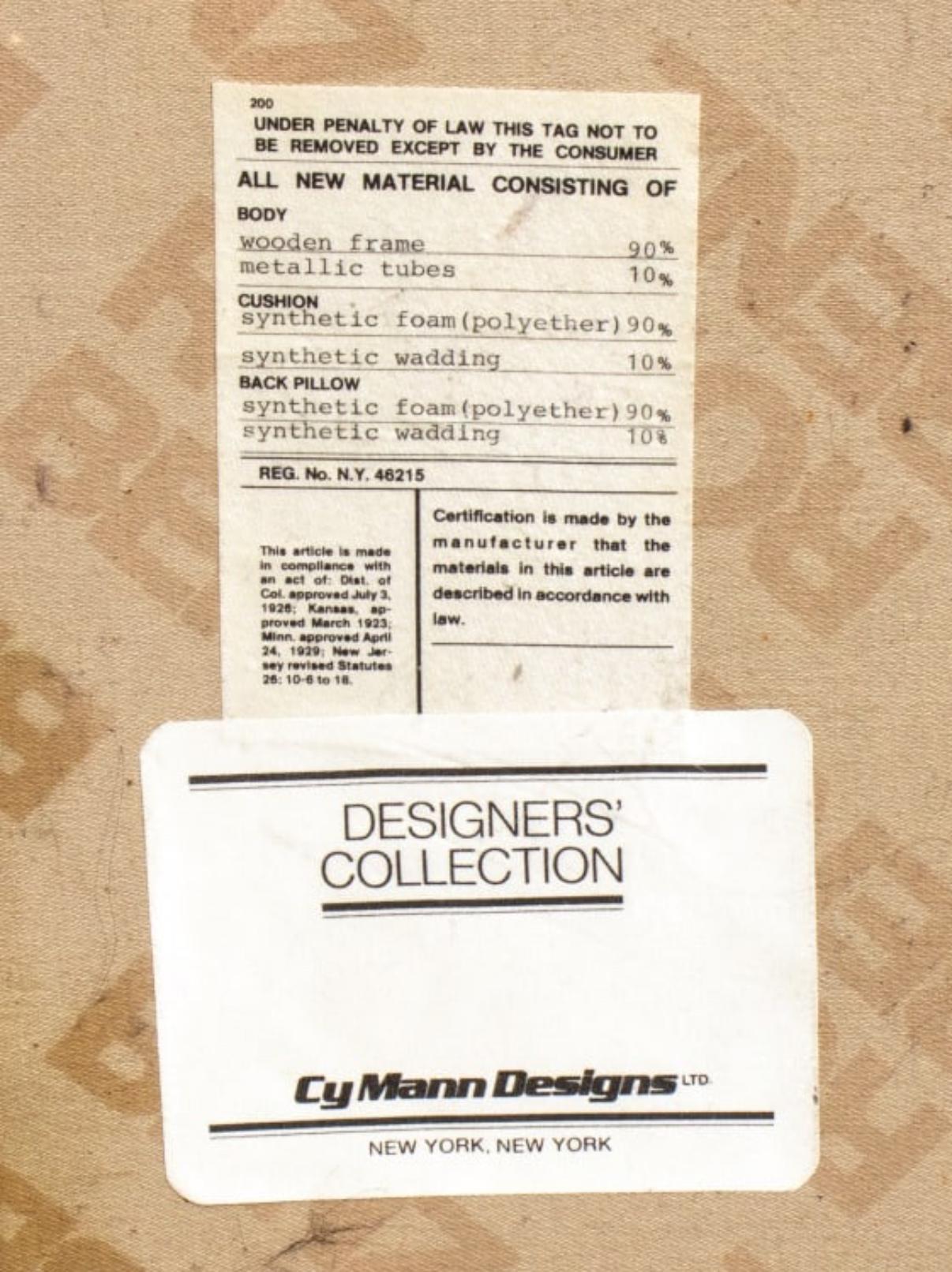 Leather Post modern bright red leather lounge chair with ottoman by Rolf Benz