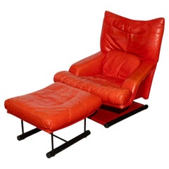 Post modern bright red leather lounge chair with ottoman by Rolf Benz