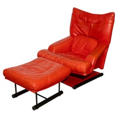 Post modern bright red leather lounge chair with ottoman by Rolf Benz
