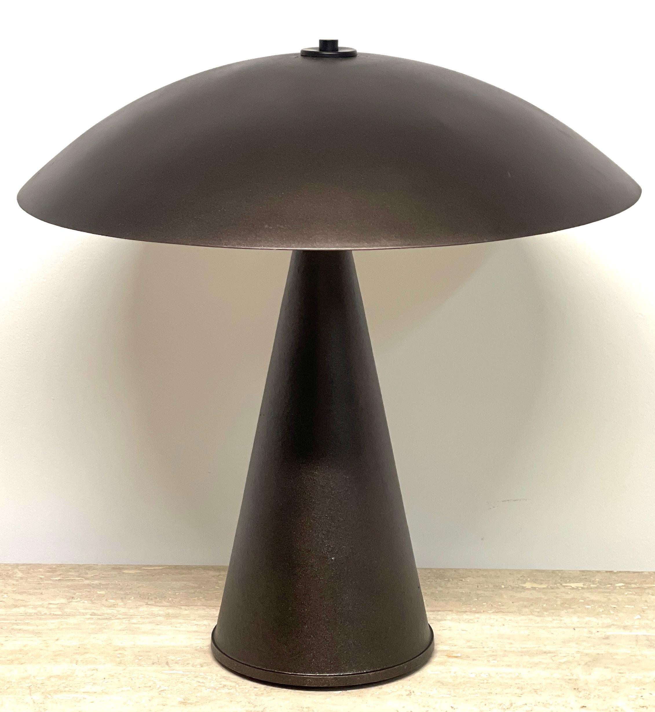 French Post Modern Bronzed 'Mushroom' Lamp, circa 1980s
European, wired for the US
Of good size, and proportions, fitted with two standard bulbs, the domed 'Mushroom' shade, with white enameled interior. Raised on a tapering 7-Inch diameter pedestal