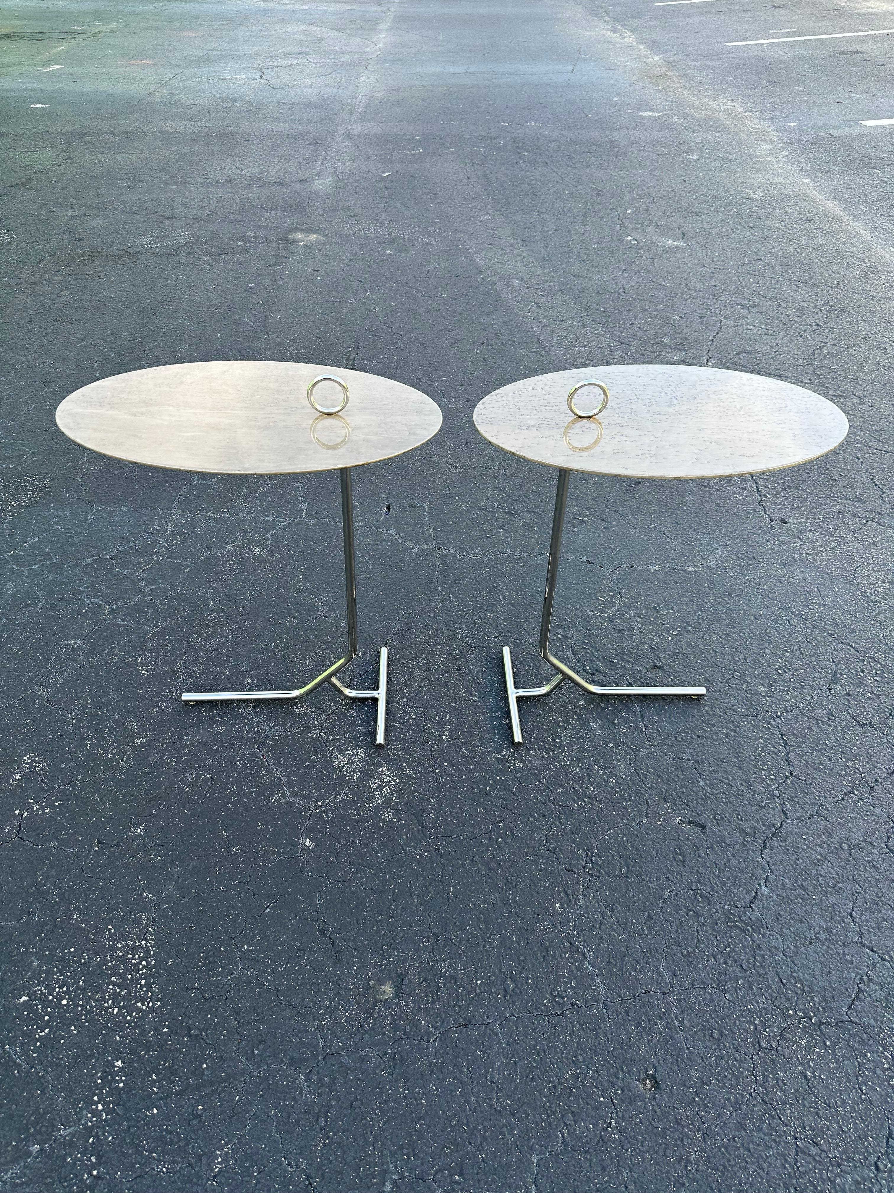 Pair of gray tone birdseye maple top, chrome base cantilever side tables. These tables are great for multiple seating styles and can be very convenient for long sofas or benches. Good used condition with some wear and age to the clear coat finish on
