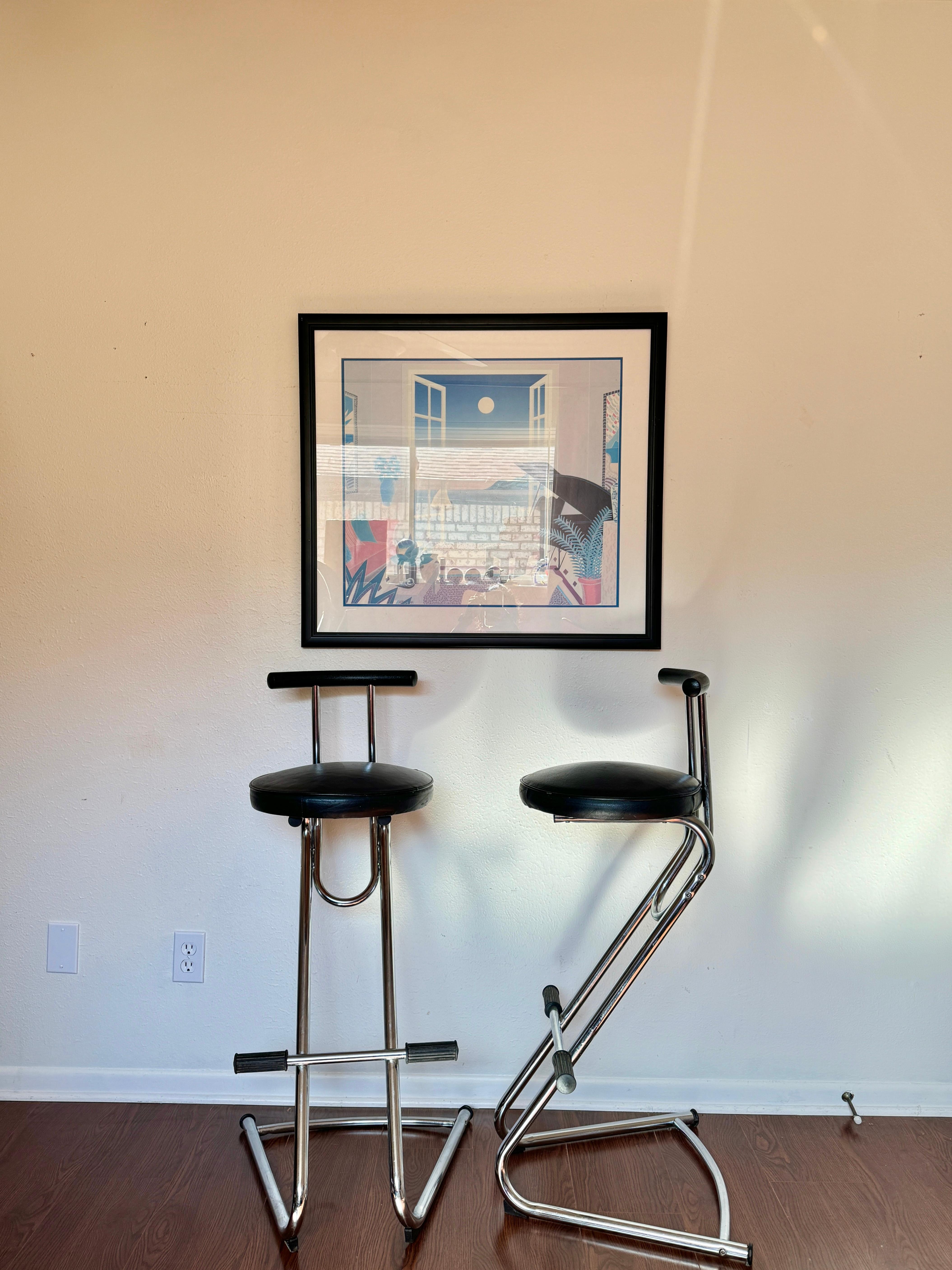 Post modern cantilevered set of chrome and black vinyl barstools, circa 1990s In Good Condition For Sale In Houston, TX