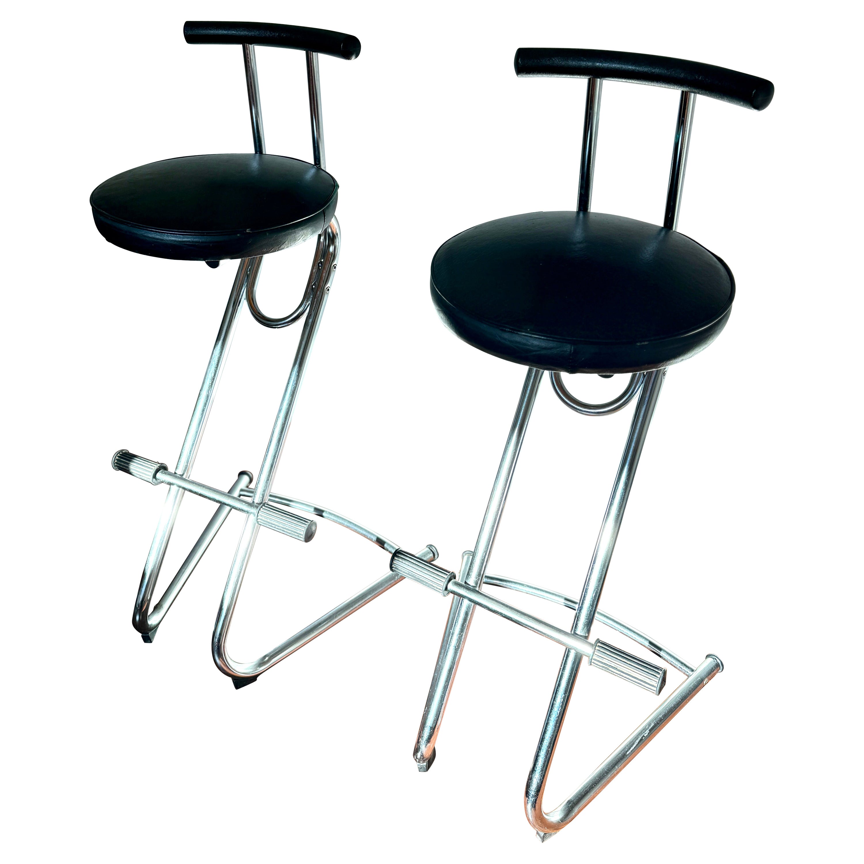 The Moderns cantilevered set of chrome and black vinyl barstools, circa 1990