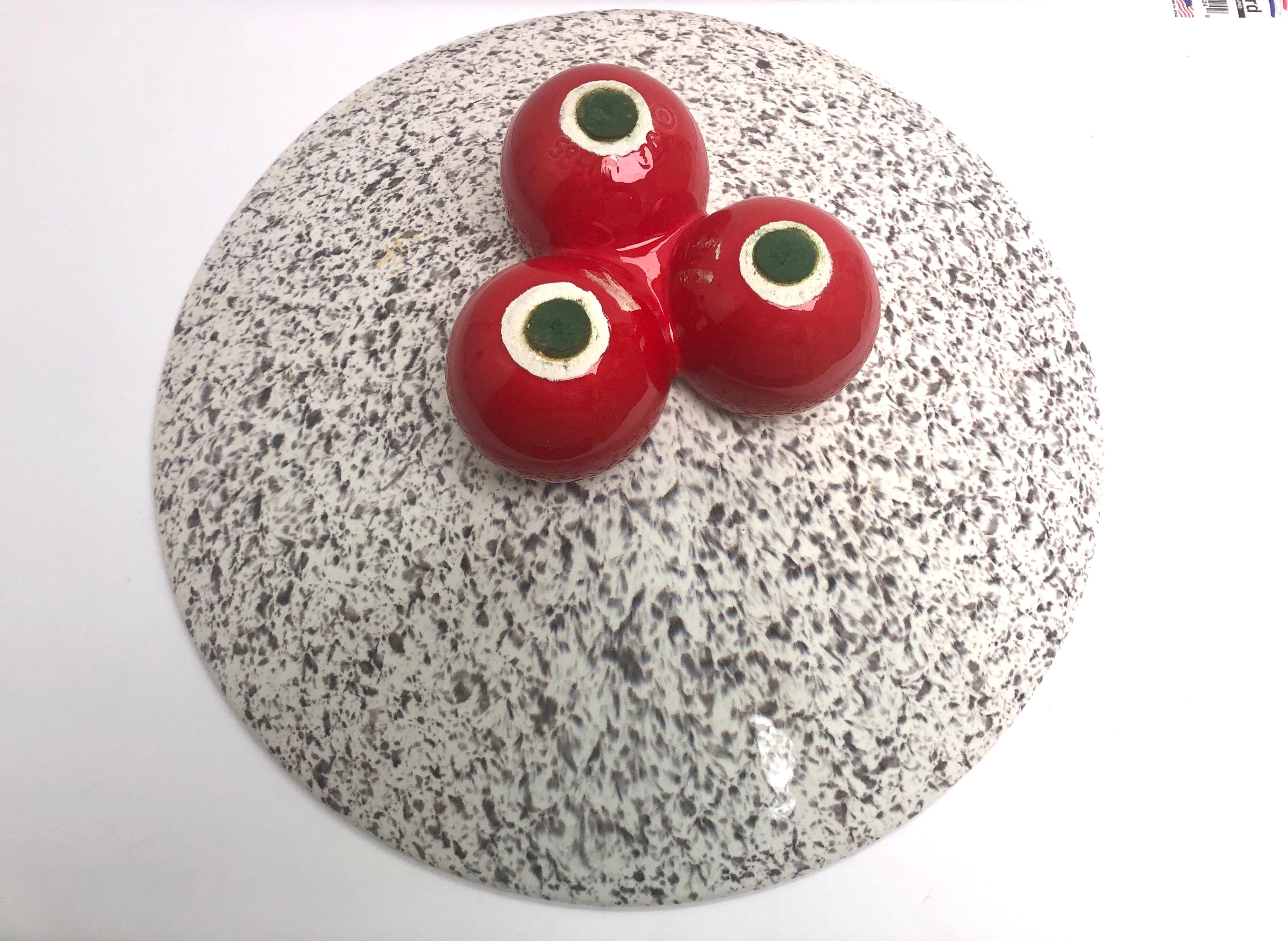 Large ceramic centerpiece by Jaru. It has the Classic granite look with 3 red spheres on the base. Simple clean design with unexpected finish.