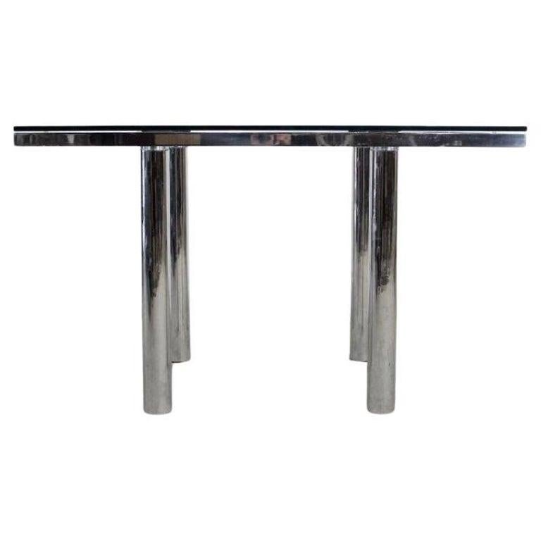 Table de salle à manger post-moderne en chrome avec plateau en verre Tobia Scarpa pour Knoll. Cadre très lourd en acier massif chromé avec d'épais pieds en tube chromé. Conçu par Afra & Tobia Scarpa pour Knoll. Table de salle à manger carrée. Bon