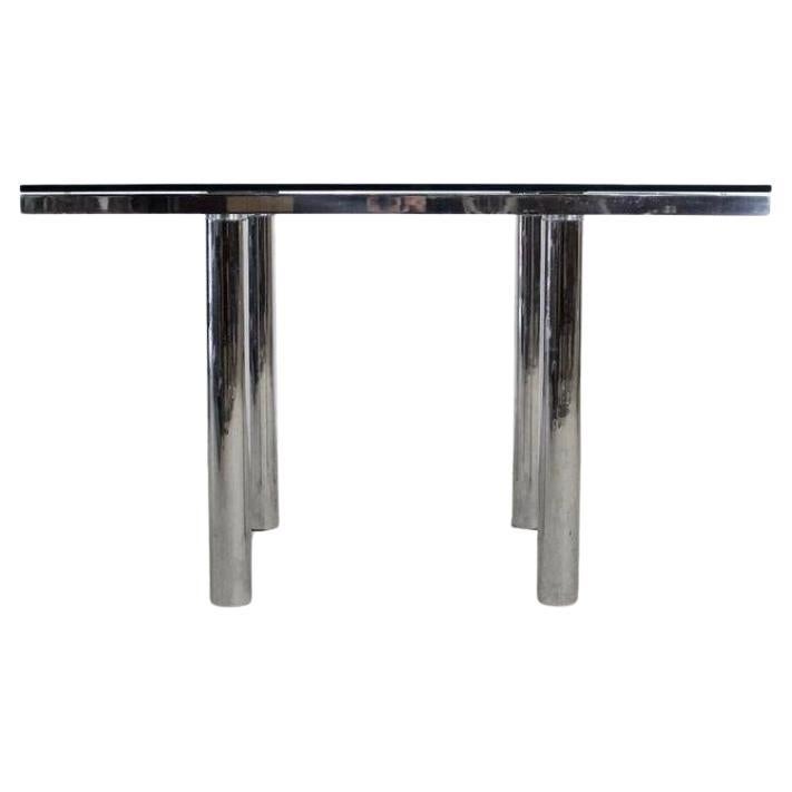 Post modern chrome with glass top Tobia Scarpa for Knoll Dining Table. Very heavy solid steel chrome frame with thick chrome tube legs. Designed by Afra & Tobia Scarpa for Knoll. Square dining table. Good pre owned condition. Located in Brooklyn