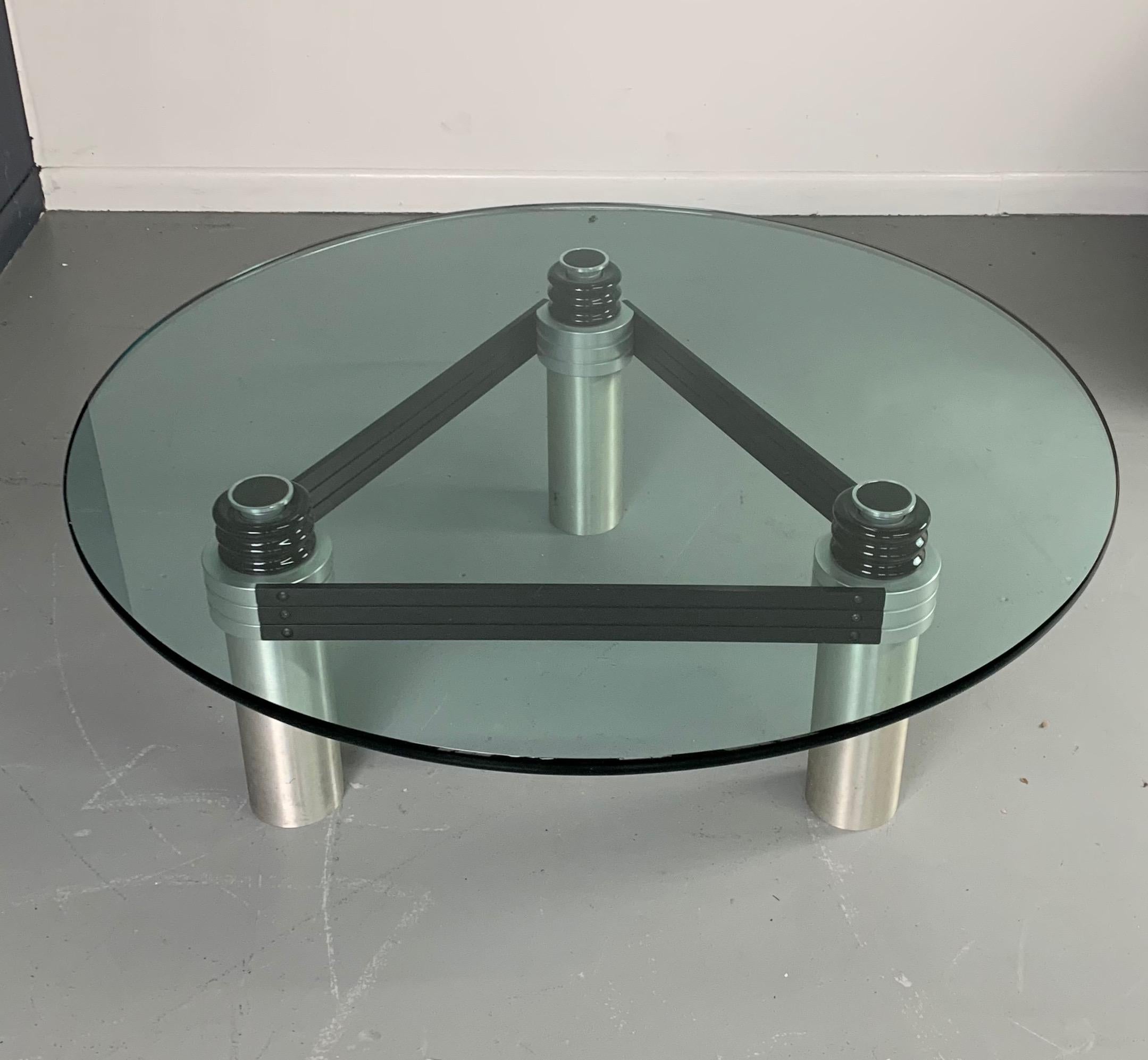 This terrific coffee table designed and built by Philadelphia furniture legend Bruce Kaiser uses an unusual combination of metals and ceramics. This is a 42