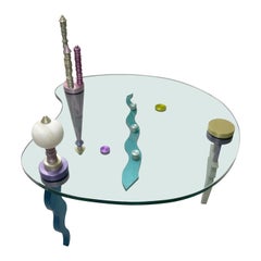 Post Modern Coffee Table Glass and Colorful Sculpture Metal 1980s