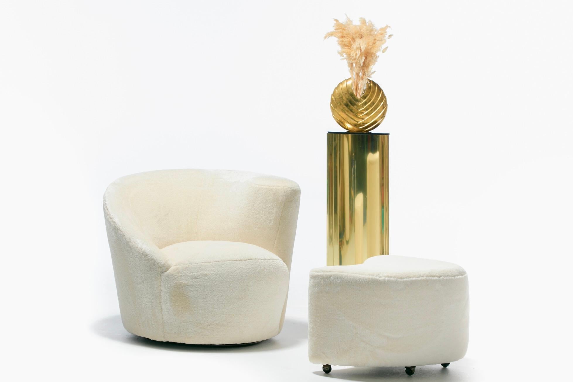 Any object placed atop this 1984 Curtis Jeré Pedestal is highlighted and enhanced. Sophisticated glamour from every angle. This sultry Post Modern pedestal features concave angled sides that float over a similarly shaped black base. The brass glows