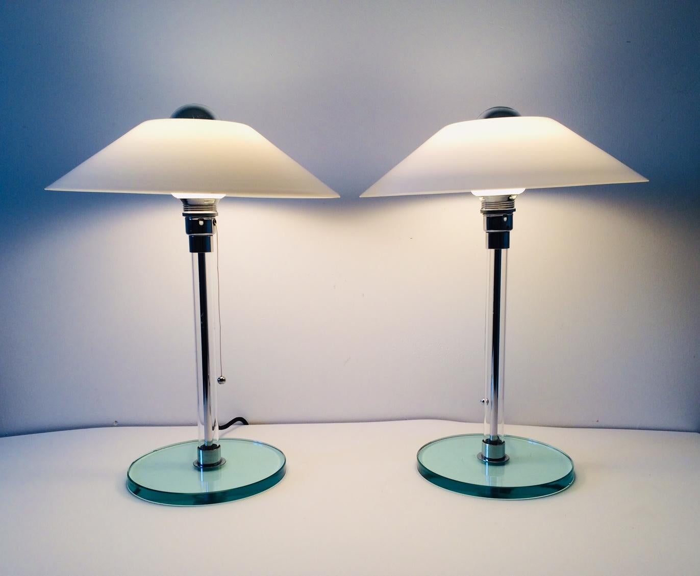 Vintage Post Modern Design set of 2 table lamp or desk lamps in glass with metal fittings. Made in Italy, 1980's. In the style of Poulsen lamp design. Art Deco in style and form. Superb high quality design lamps. Rare model. All glass construction