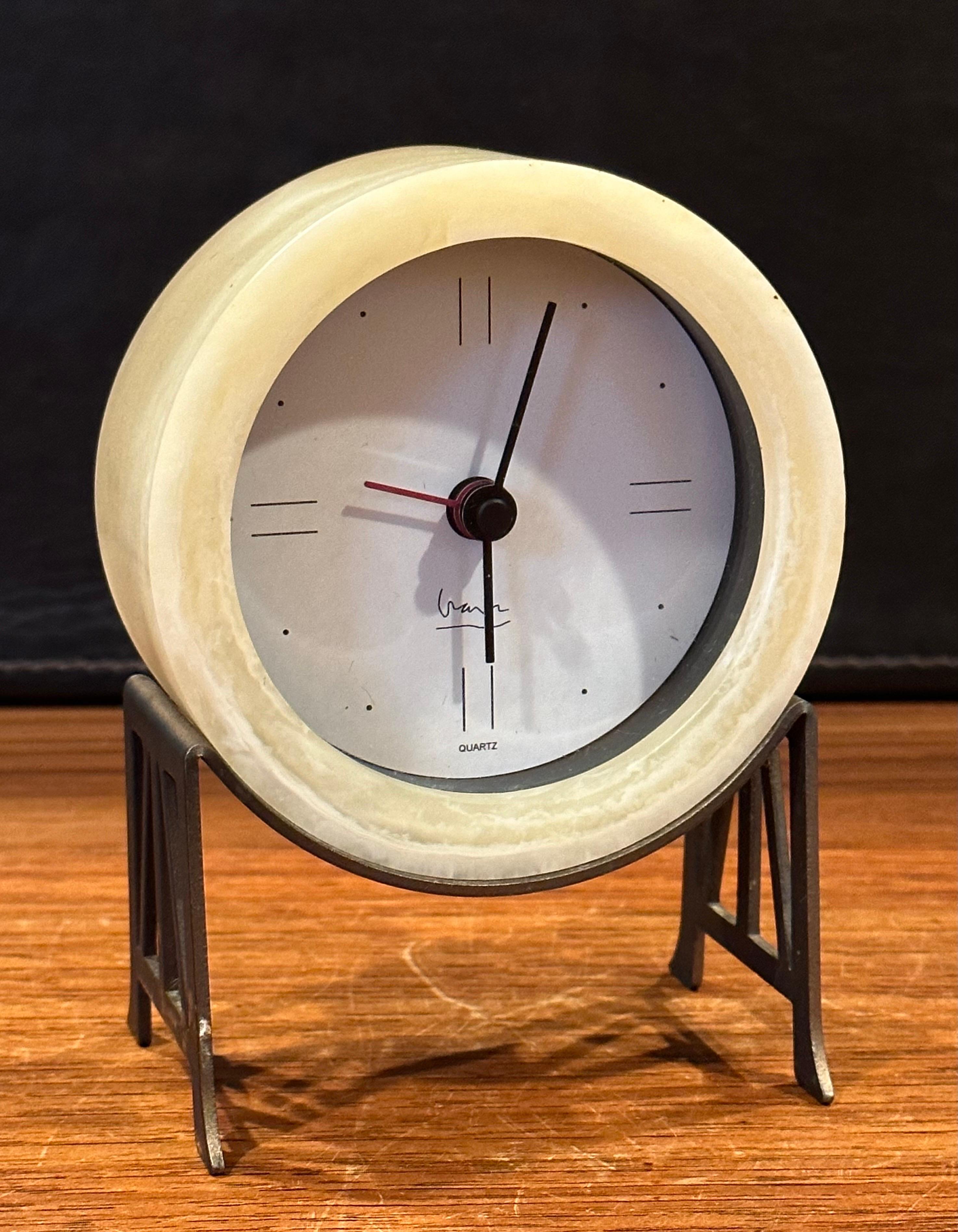 A nice post-modern desk clock by Michael Graves, circa the 1980s. The clock is in good vintage condition and measures 4