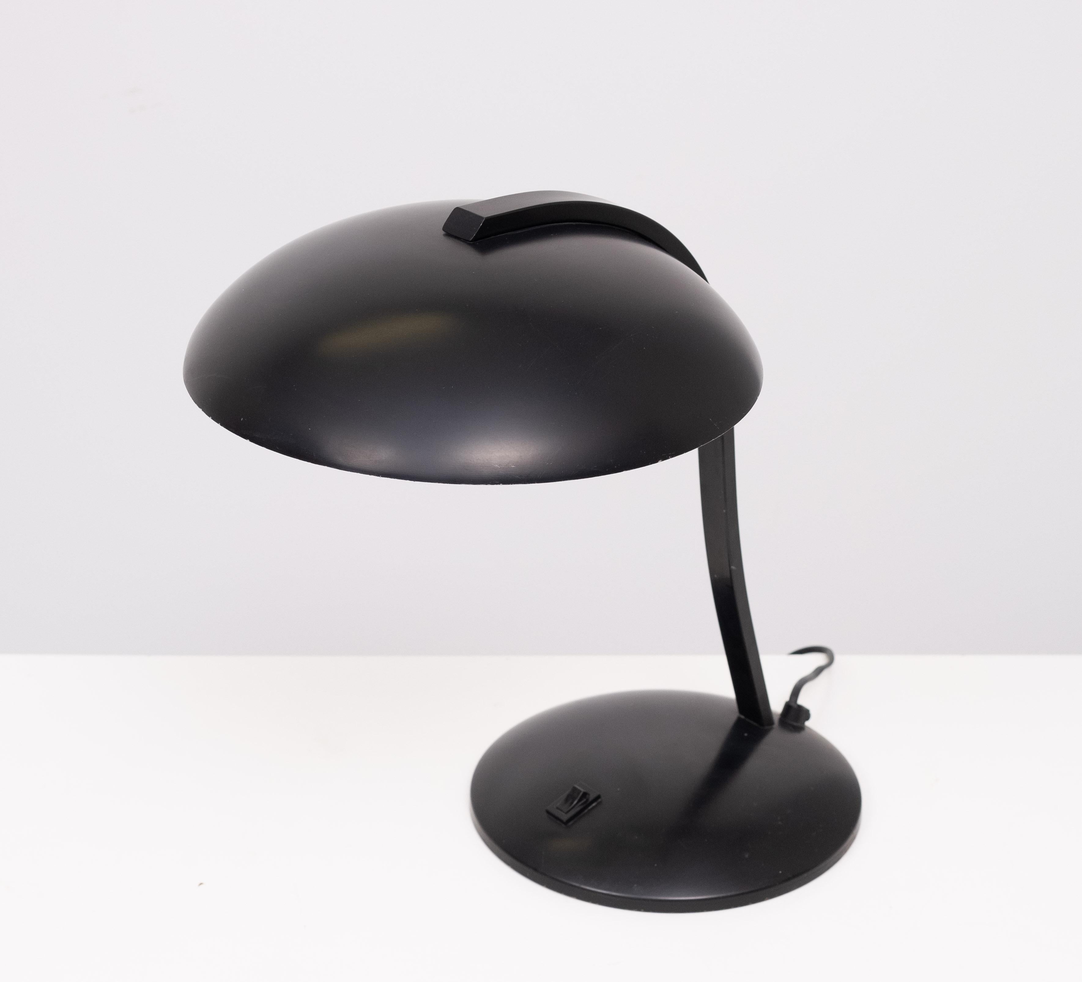 Very nice Italian Desk lamp .Black Metal . Post Modern in style 
Manufactured and signed  Nuova Veneta Lumi,  1980s 
