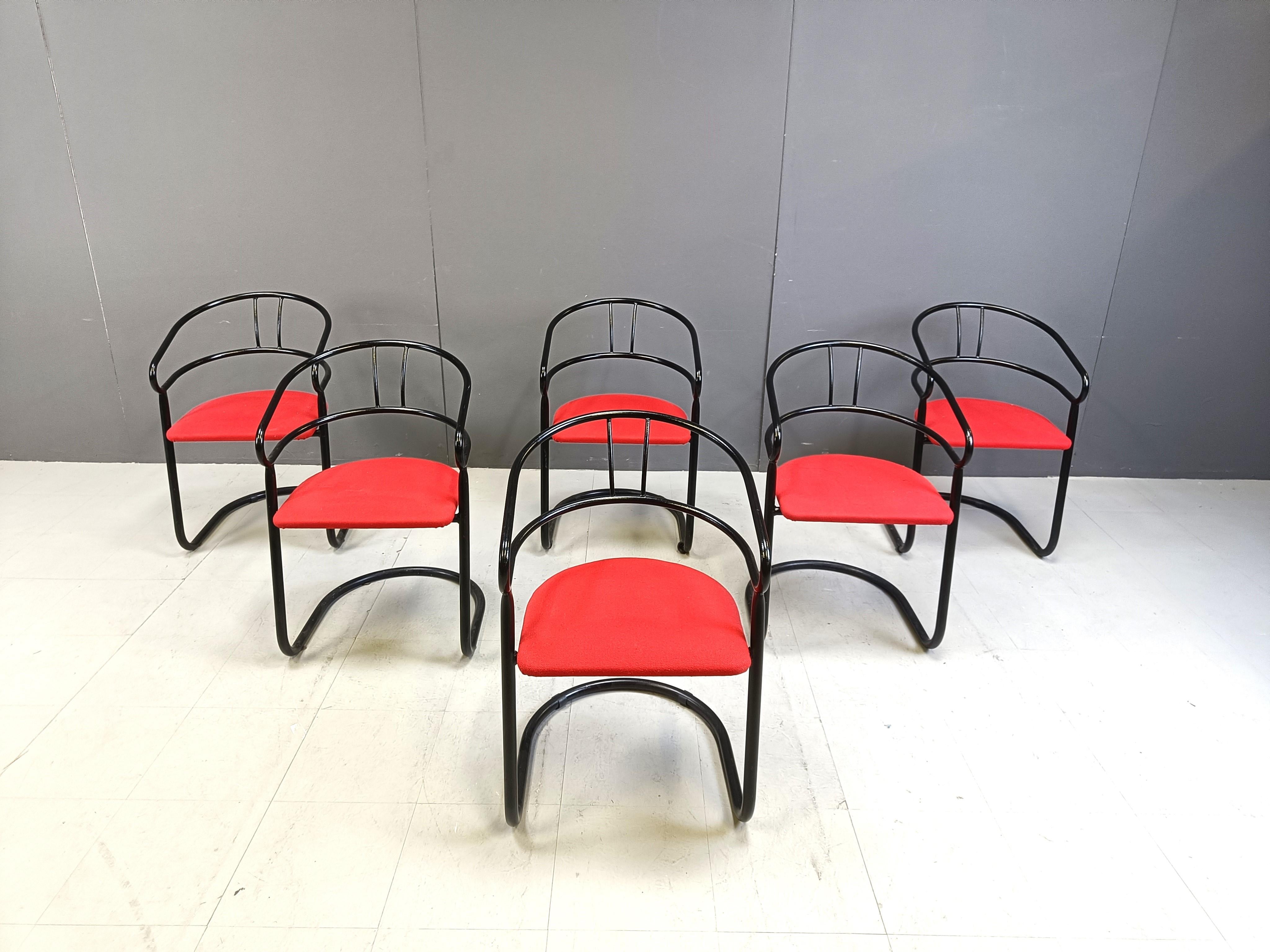 Post modern design dining chairs by Vepa, Netherlands.

They feature a black metal frame and red fabric seats.

1980s - Italy

Good condition

Height: 103cm
Width: 50cm
Depth: 45cm
Seat height: 45cm

Ref.: 141419

*price is for the set