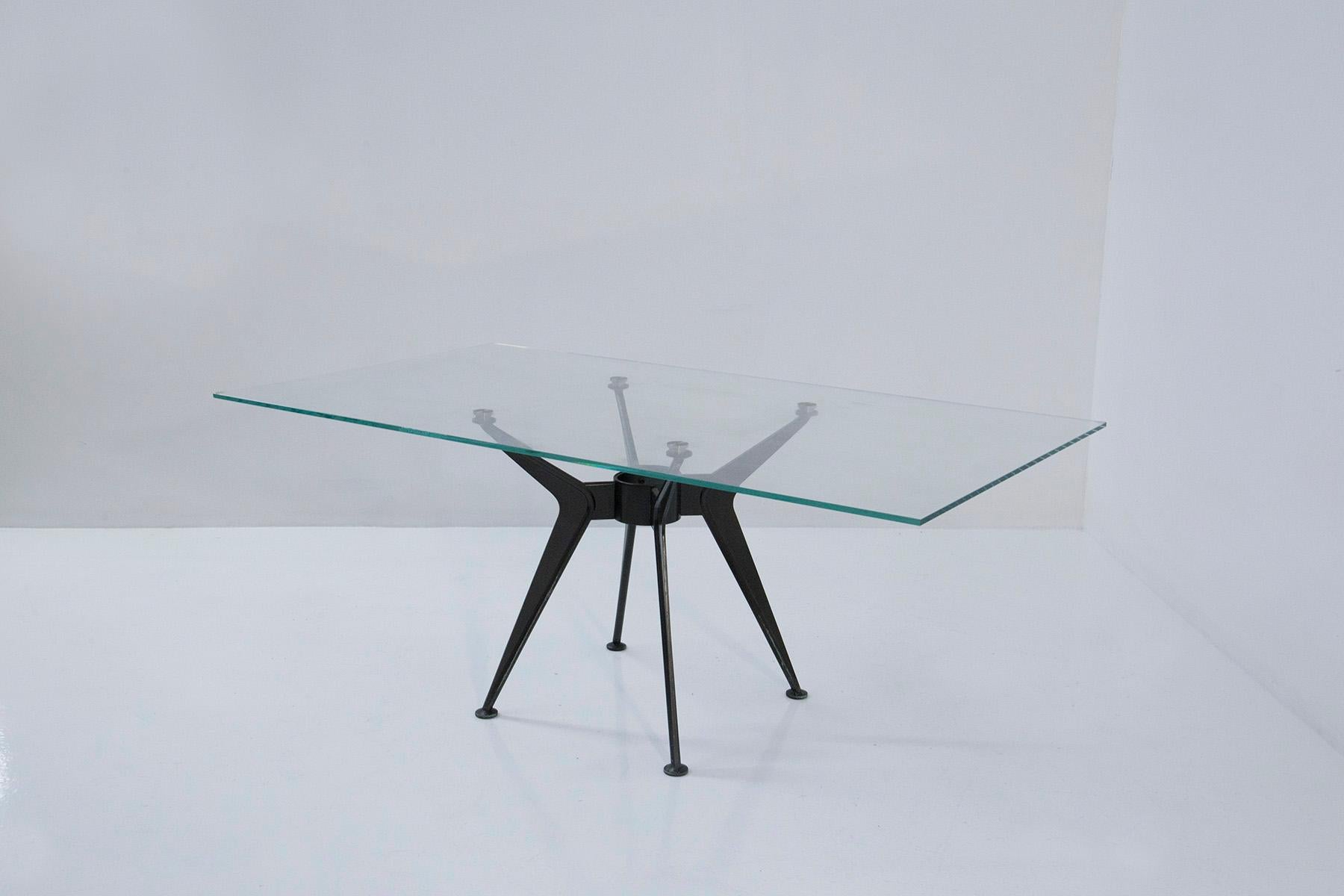 In a world where design transcends time, there emerges a masterpiece that dances on the delicate line between the past and the future. A relic from the late 1970s to the early 1980s, this dining table is not merely an artifact of its era; it is a