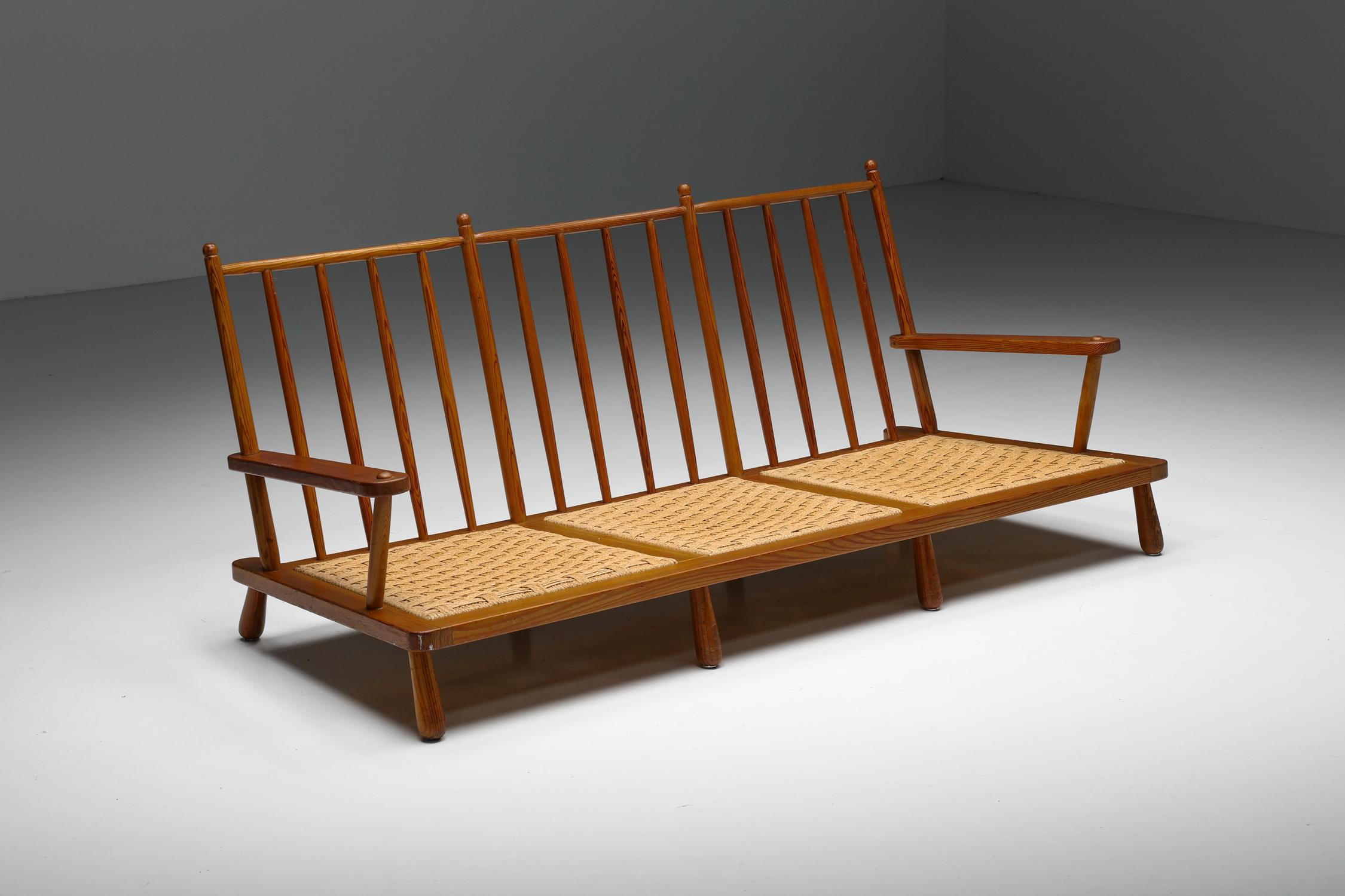 Post-Modern; Dutch Design; Three-Seater; by Gerard Van Den Berg; Rattan; Wood; 

This three-seater sofa is designed by Gerard van den Berg in the 1990s. Plain, slightly curved, and its suggestive and unmistakable forms make this piece typical of