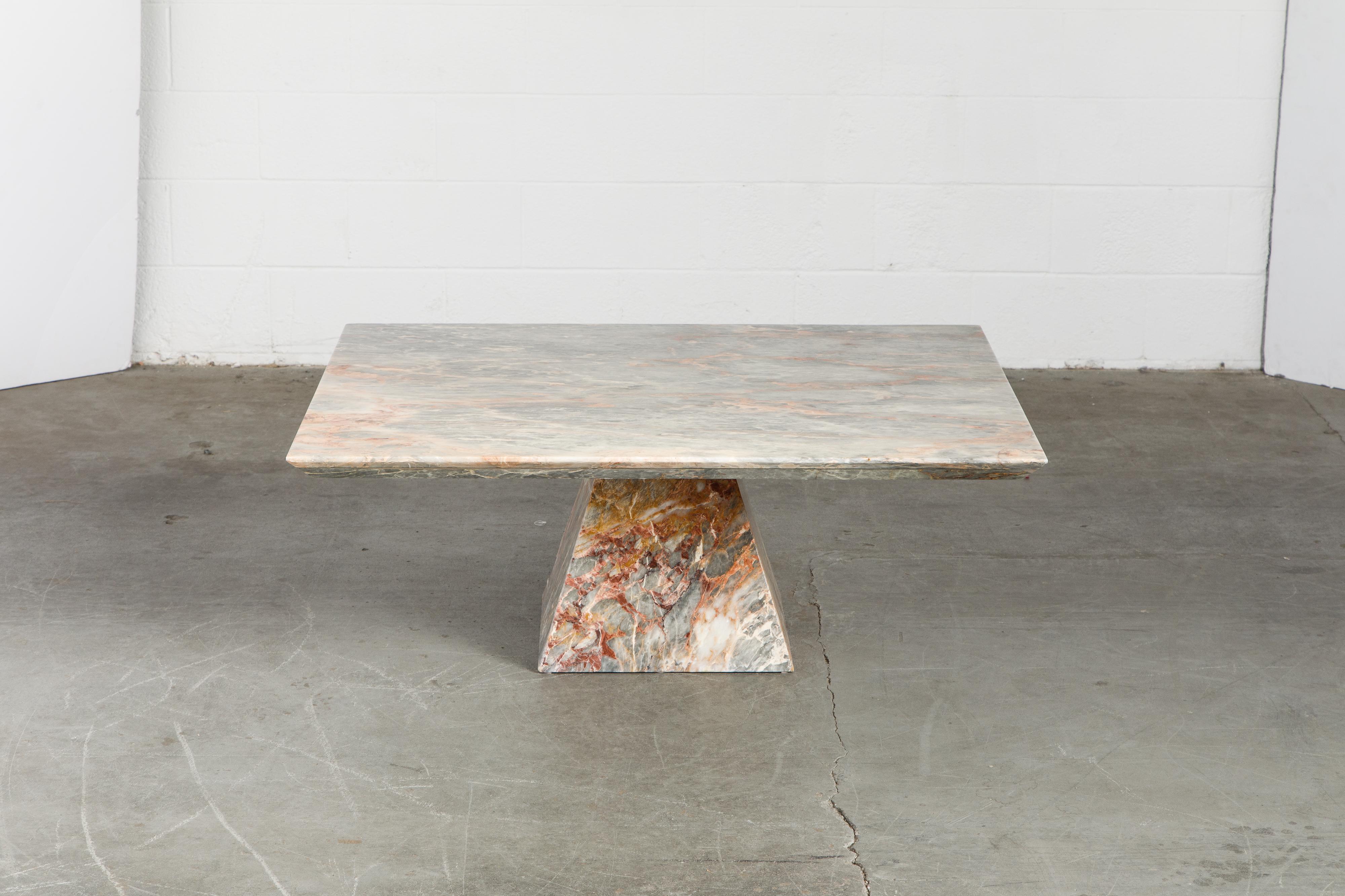 So gorgeous and designer on-trend, this heavy and substantial Post-Modern coffee table is constructed from a highly figured and beautifully grained stone. We are not sure if this is a marble or perhaps a granite but it is beautiful and has a soft
