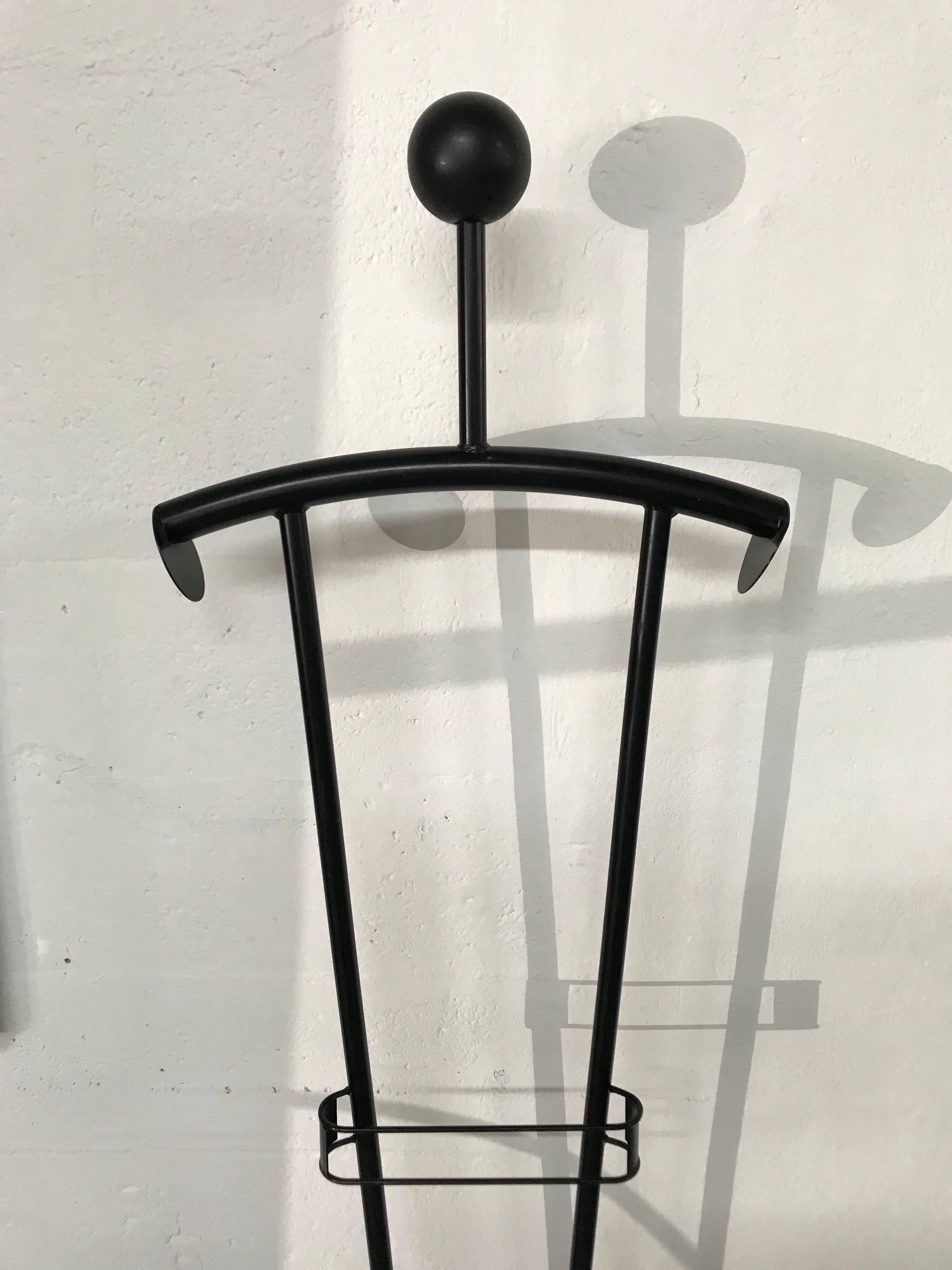Memphis style valet stands or coat rack rendered in black powder coated metal, pair available, priced individually.