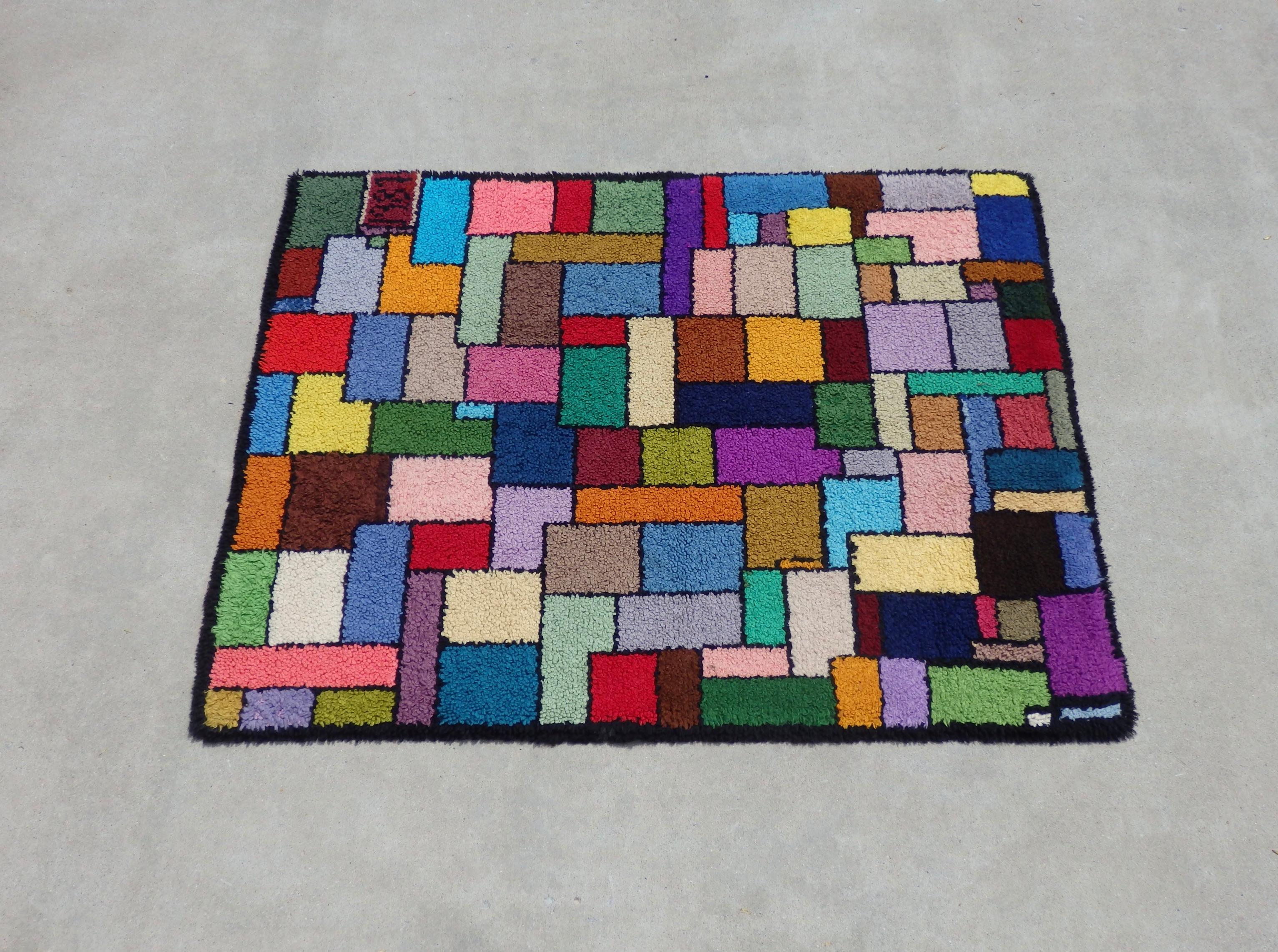 Vibrant multi-color block geometric Postmodern Folk Art Latch Hook rug, Mondrian Themed. Dated 1987.