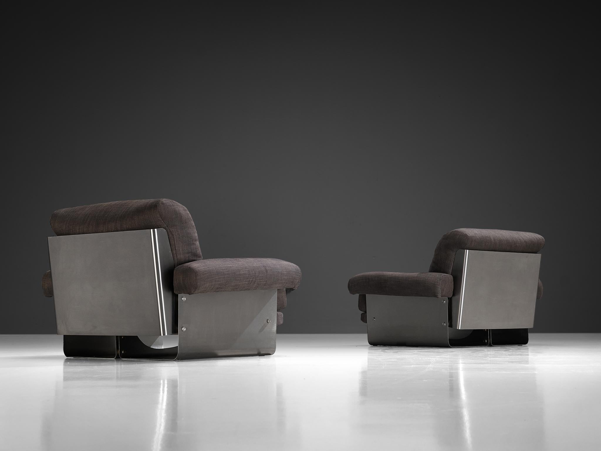 Pair of lounge chairs, brushed steel, fabric, France, 1970s

These armchairs are a prime example of the 1970s French design movement, which emphasized modernism and industrial materials, particularly (stainless) steel. The sleek lines and clean