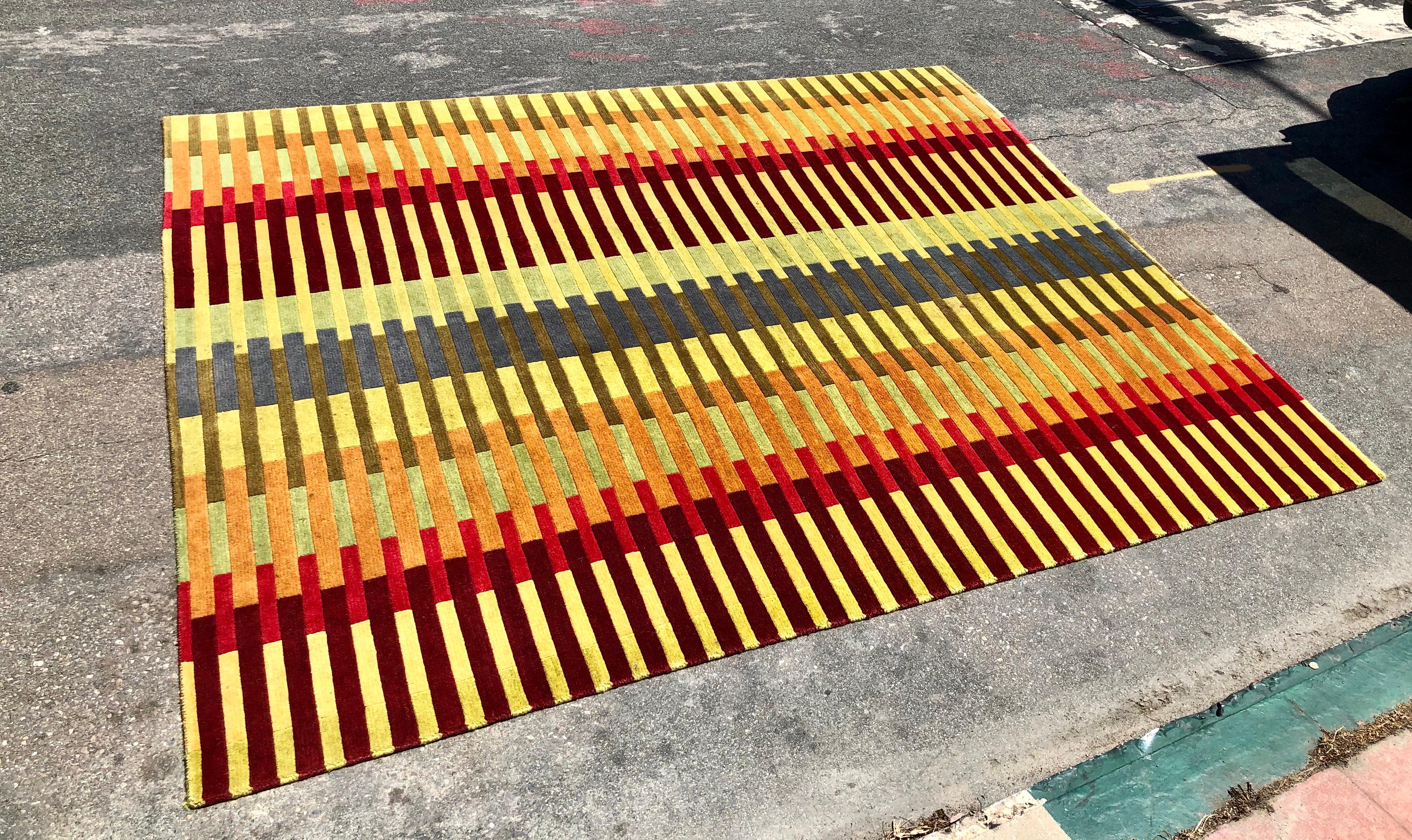 Beautiful Geometric large wool rug nice condition clean with light wear non-smoker home. Great quality nice and heavy Great colors. and design.