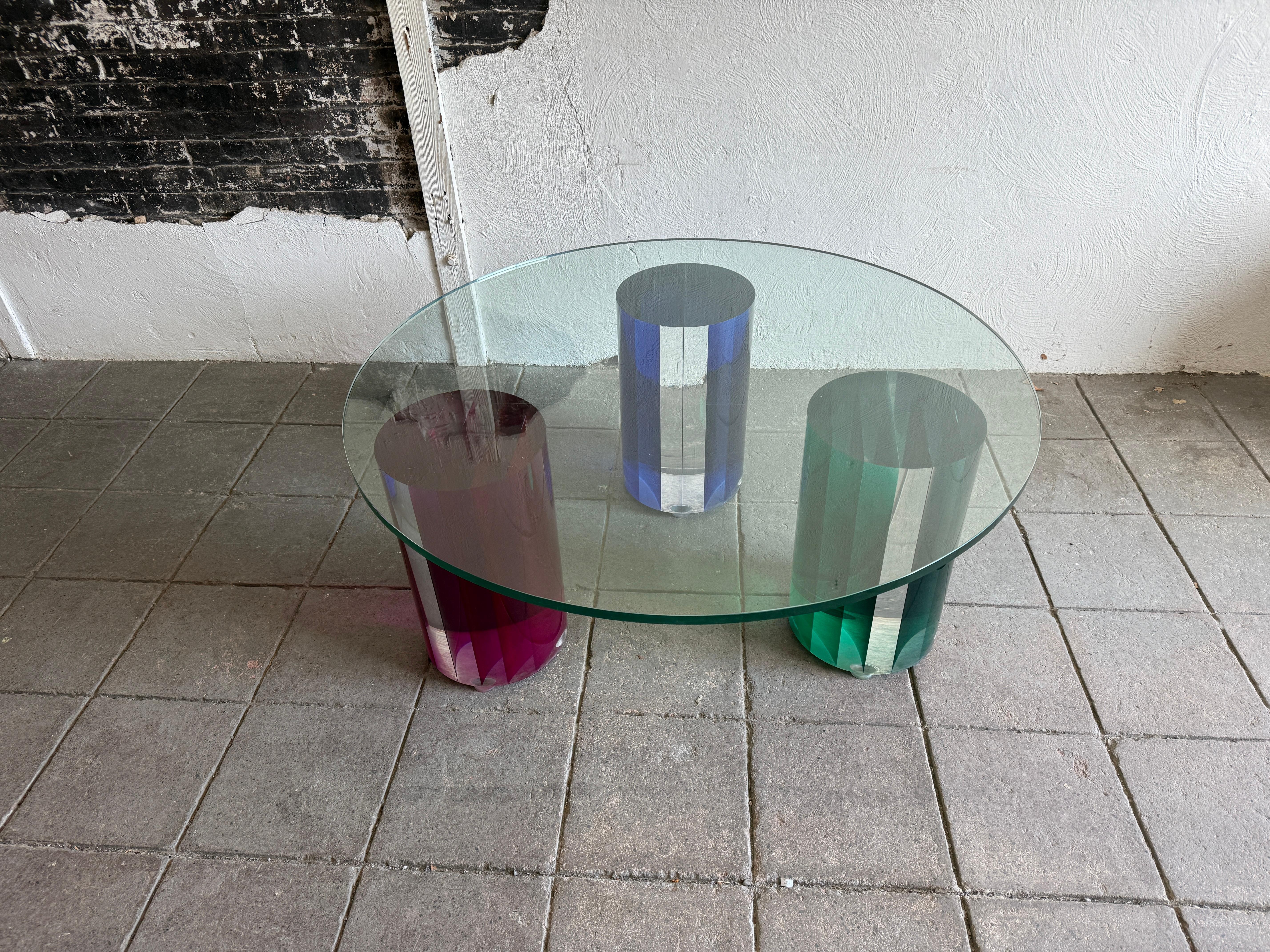 Late 20th Century Post modern glass Coffee Table with color plexiglass round bases For Sale