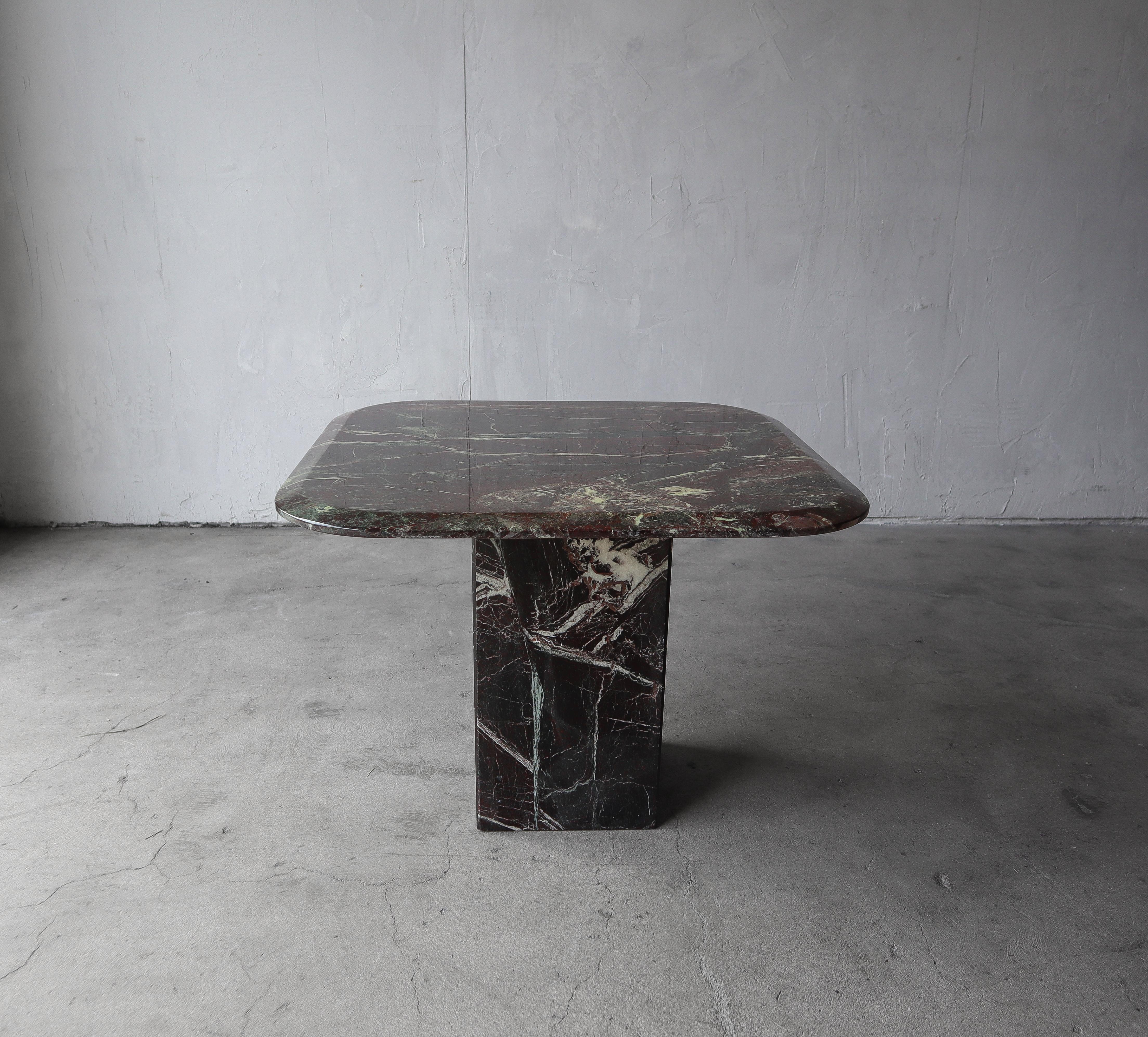 Gorgeous emerald green and maroon marble side table. A truly stunning table.

No damage to be noted.