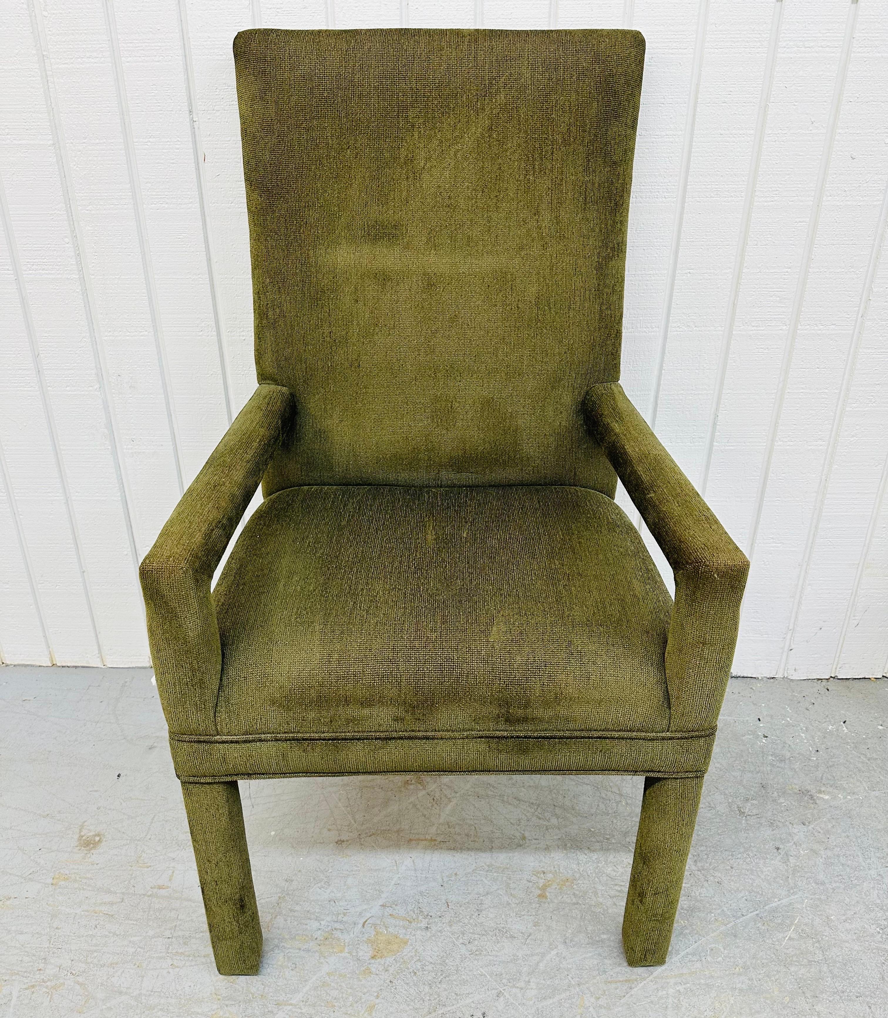 This listing is for a set of eight Post Modern Green Upholstered Brass Dining Chairs. Featuring a straight line high-back design, two fully upholstered arm chairs, six straight chairs with brass legs, and an original green upholstery. This is an