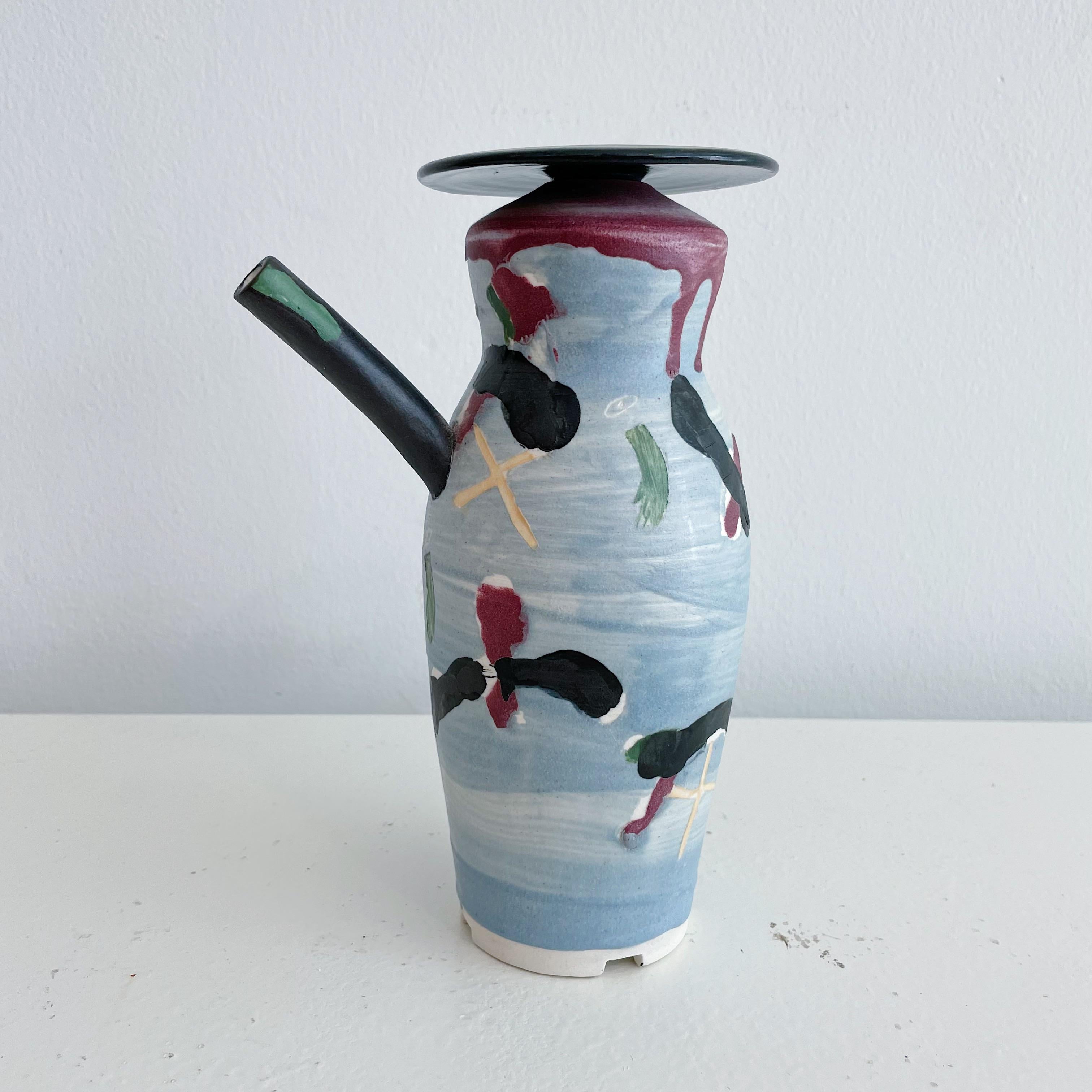 Post-modern studio pottery spouted, lidded vessel with colorful hand decoration Circa 1986. Signed on underside BL 1986.