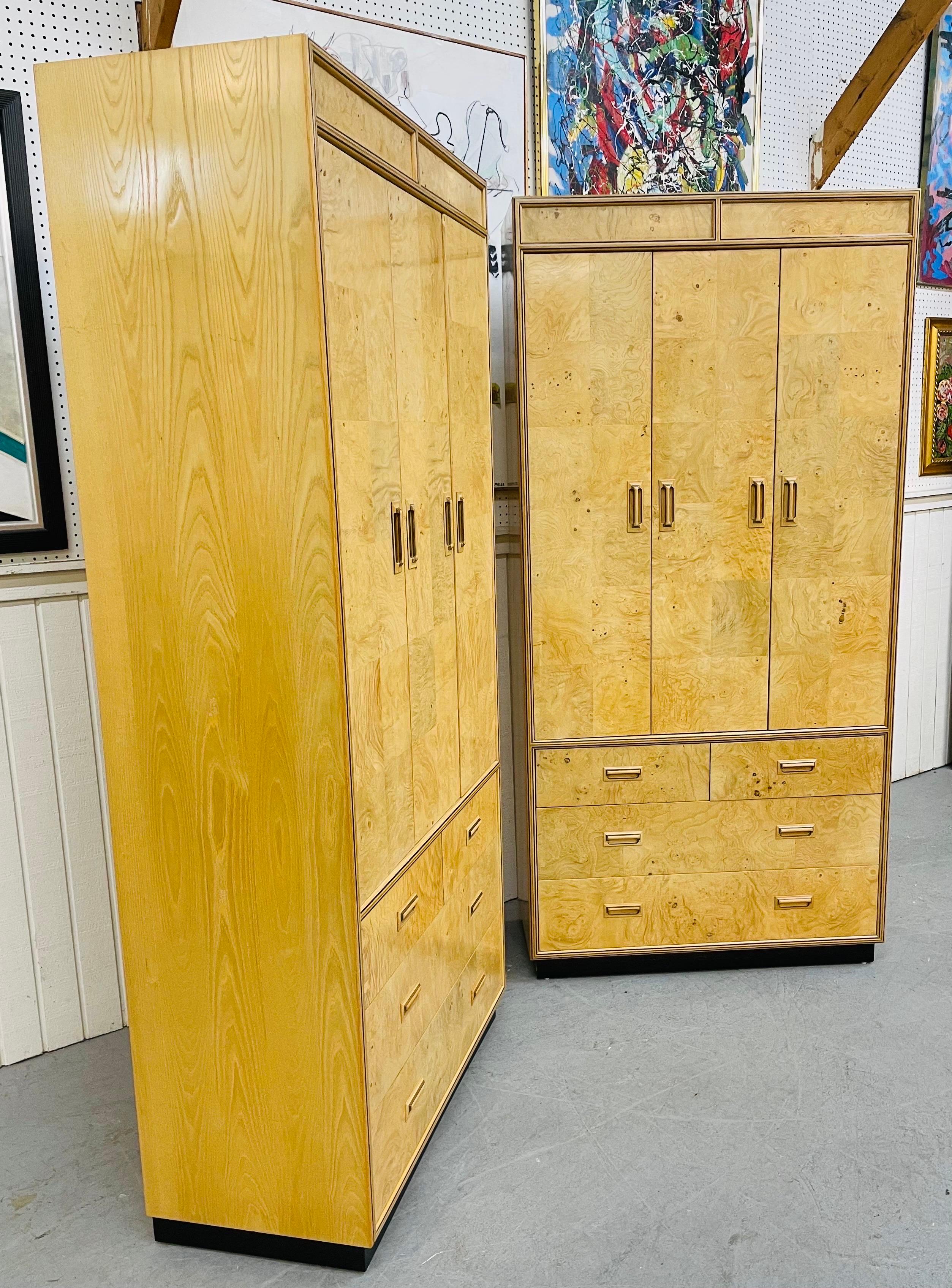 This listing is for a pair of vintage Henredon scene two burled wood armoires. Featuring double doors that open up to three storage shelves, top shelf dividers, three large drawers at the bottom, recessed wood pulls, a black plinth base, and a