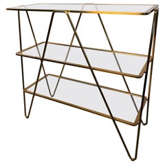 Post Modern Italian Brass
Glass Hairpin Etagere Post Modern Italian Brass
Glass Hairpin Etagere