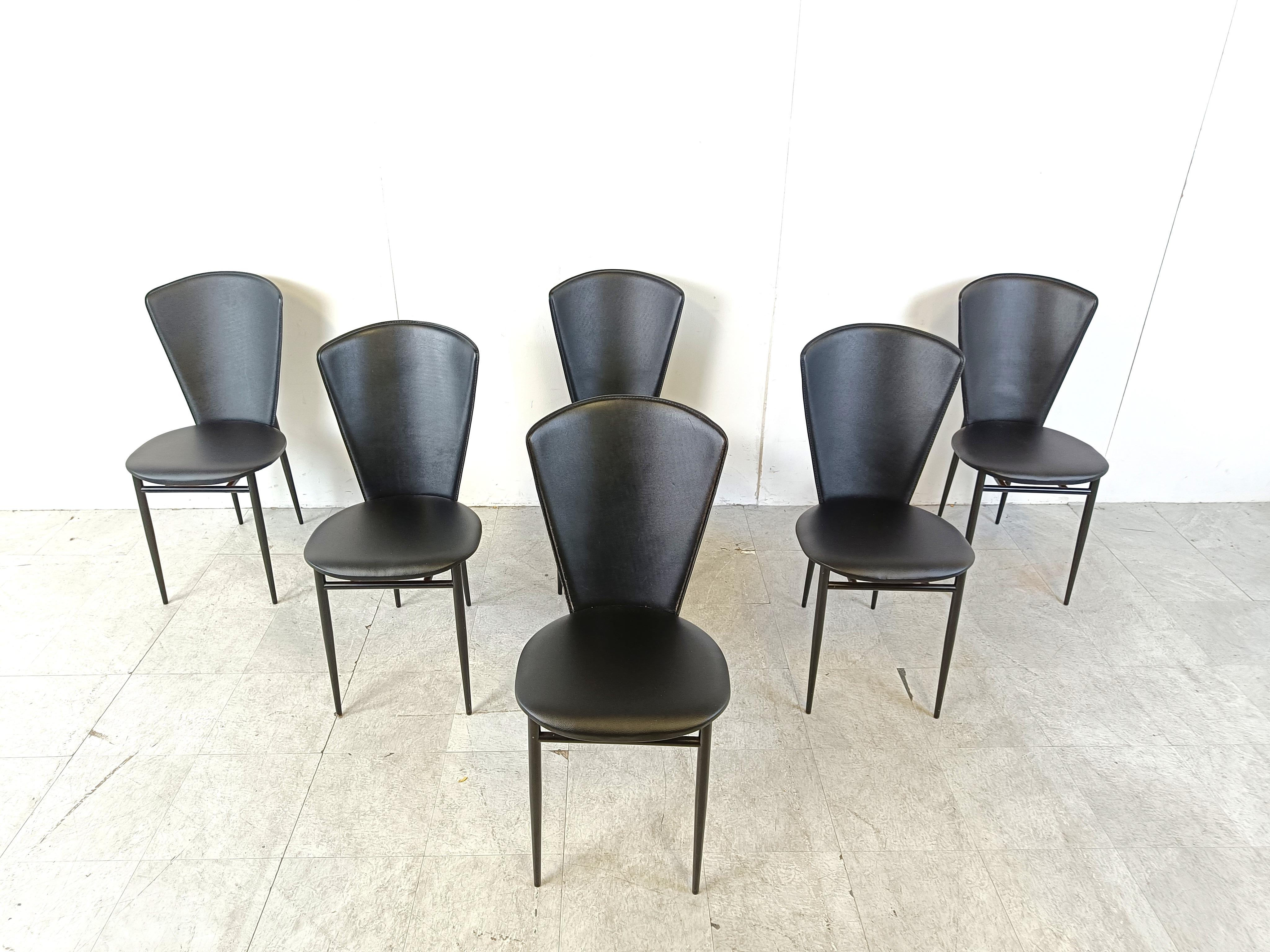 Elegant post modern italian design dining chairs with black skai upholstery on a black metal frame.

Timeless design chairs in very good condition.

Dimensions:
Height: 90cm
Width: 43cm
Depth: 47cm
Seat h eight: 45cm

Price is for the set.

Ref.: