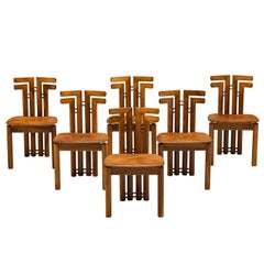 Sillas de comedor italianas postmodernas de nogal y cuero coñac