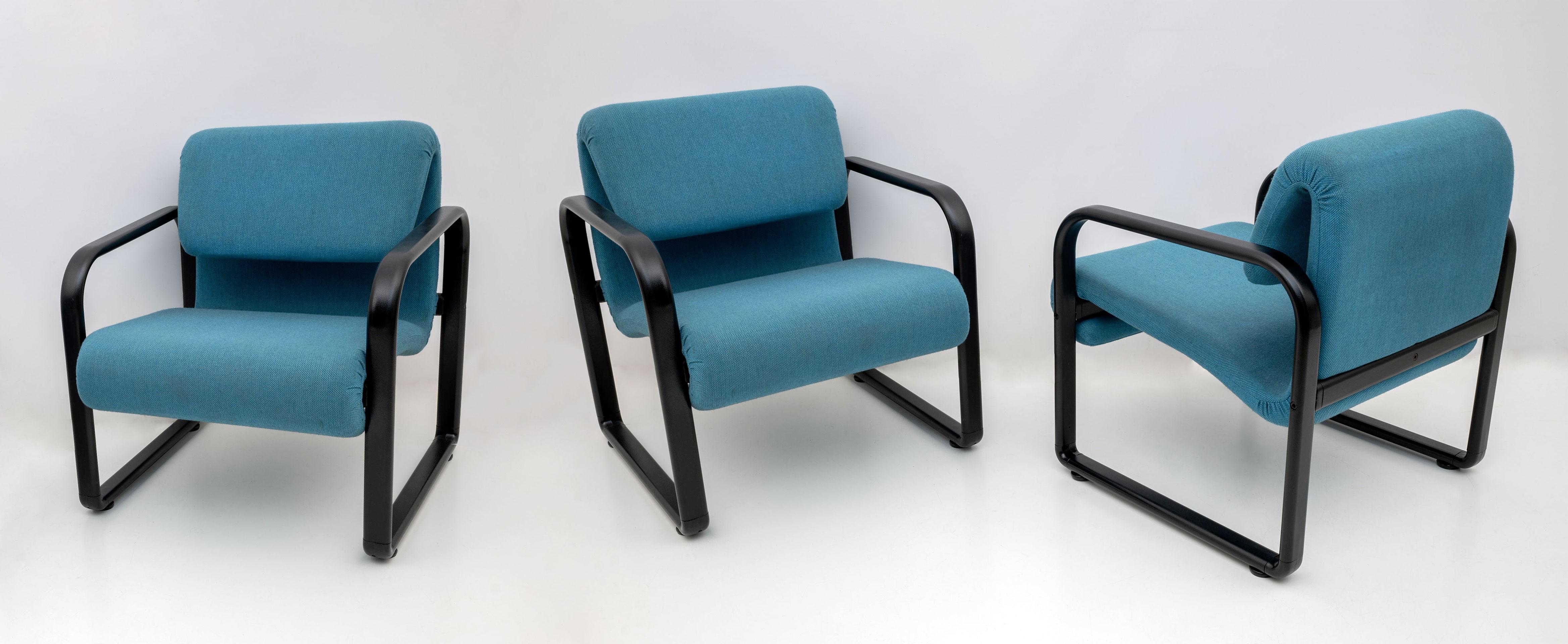 Three 1970s design armchairs in black lacquered iron and seat in removable blue fabric. Produced by the famous Italian company Artflex.

Three armchairs available, the price refers to each.
The shipping price is for all three armchairs.