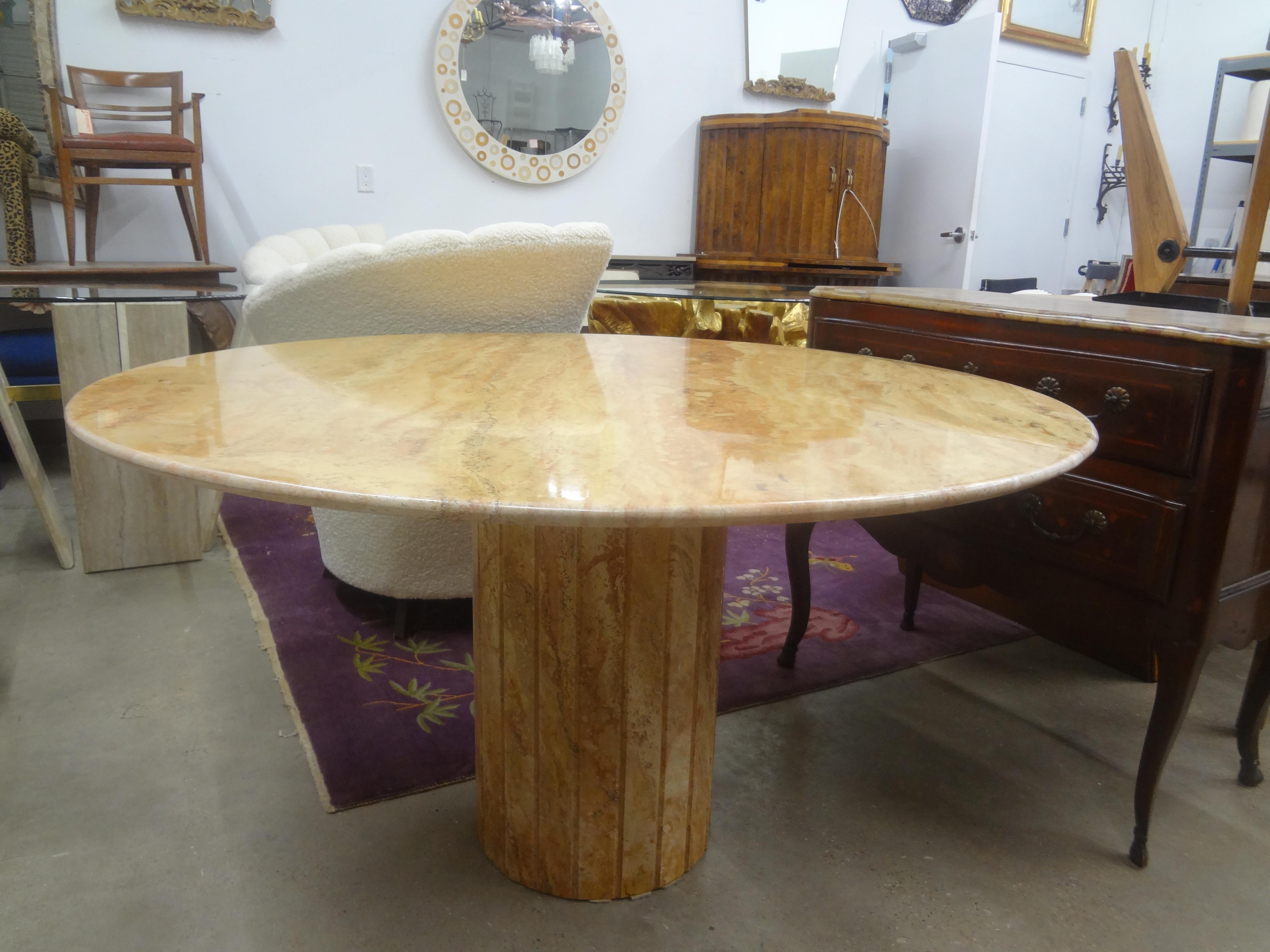Post Modern Italian Marble Center Table.
This large Italian Mario Bellini style (51 inch) marble table can be used as a center table or dining table.
Most unusual colored marble.
Stunning!