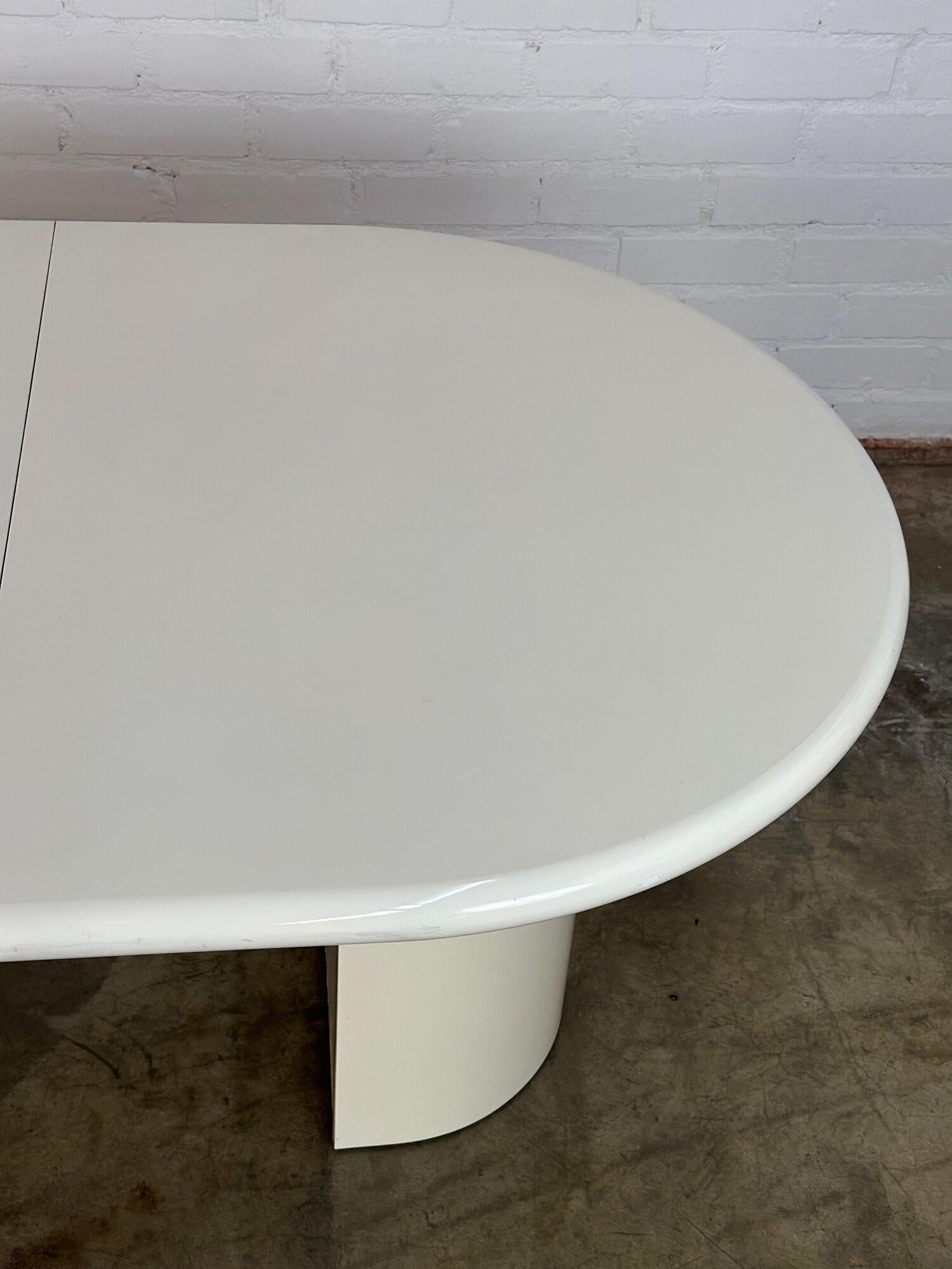 W67 W103 D42 H28.5 KNEE CLEARANCE 27.5

LEAVES 18

Vintage post modern laminate dining table im overall good vintage condition. Table has is structurally sound and fully functional with very minimal wear. Wear has been pictured closely.