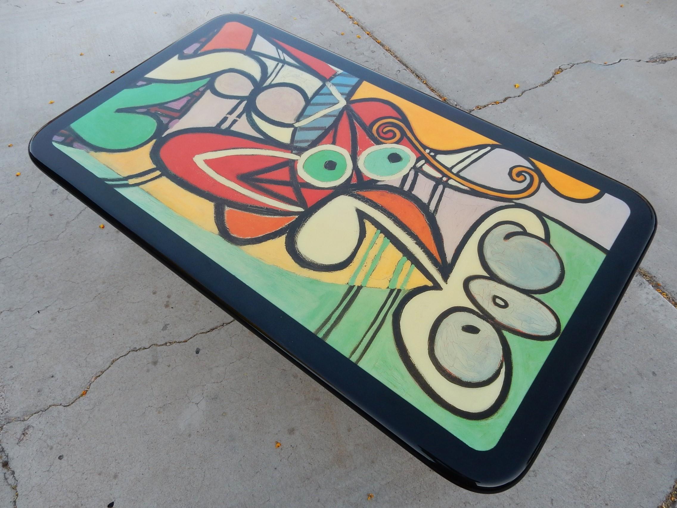 Vintage cocktail table with a lacquered Picasso's 