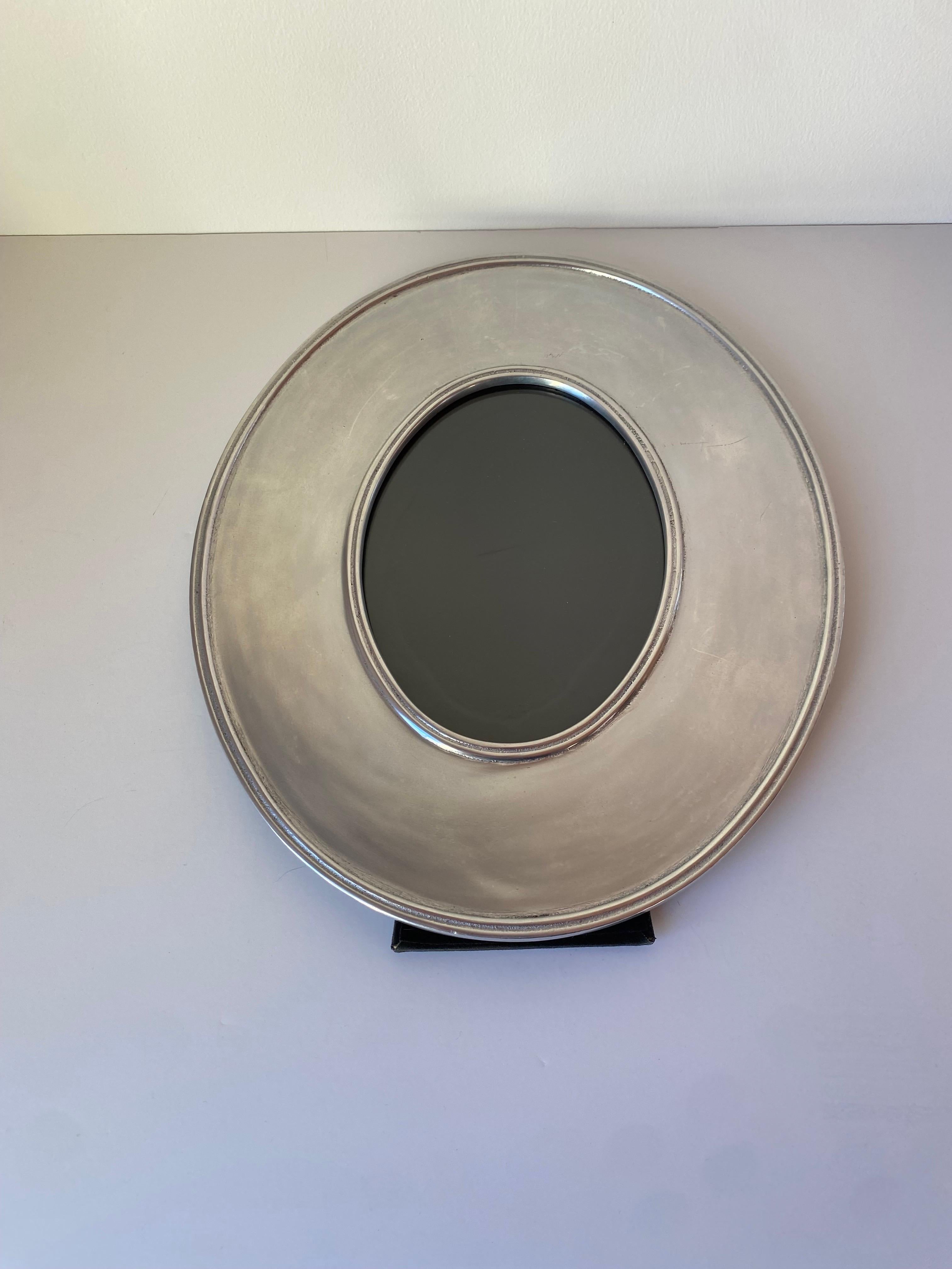 Post Modern Large Oval Disc Silver Plated Metal Photo Frame For Sale 1