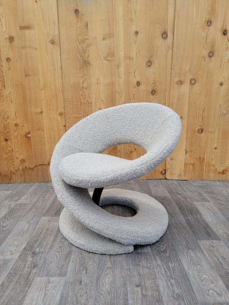 Vintage Post Modern Louis Durot Style Spiral Ribbon Lounge Newly Upholstered in Boucle 

This is a vintage post modern Louis Durot style sculptural spiral ribbon lounge chair. This has been newly upholstered in a plush steel-blu sheep-wool boucle. A