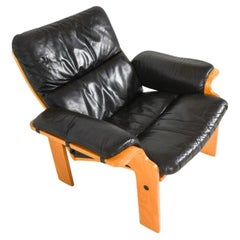 Post modern lounge chair brown leather bentwood Beech thin frame made in Germany