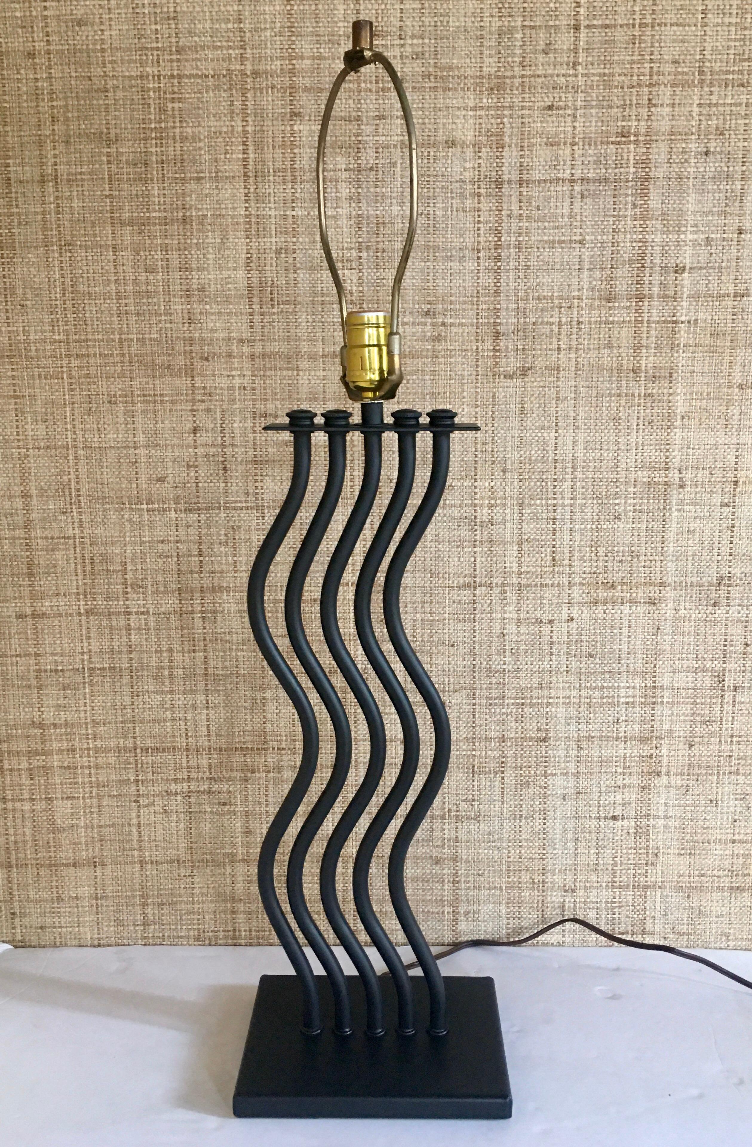 1980s Postmodern Memphis style table lamp. Sculptural design features a series of curved metal tubular bars in a powder coated matte black finish. Lamp shade not included. 

23H to socket.
30.5H to finial.