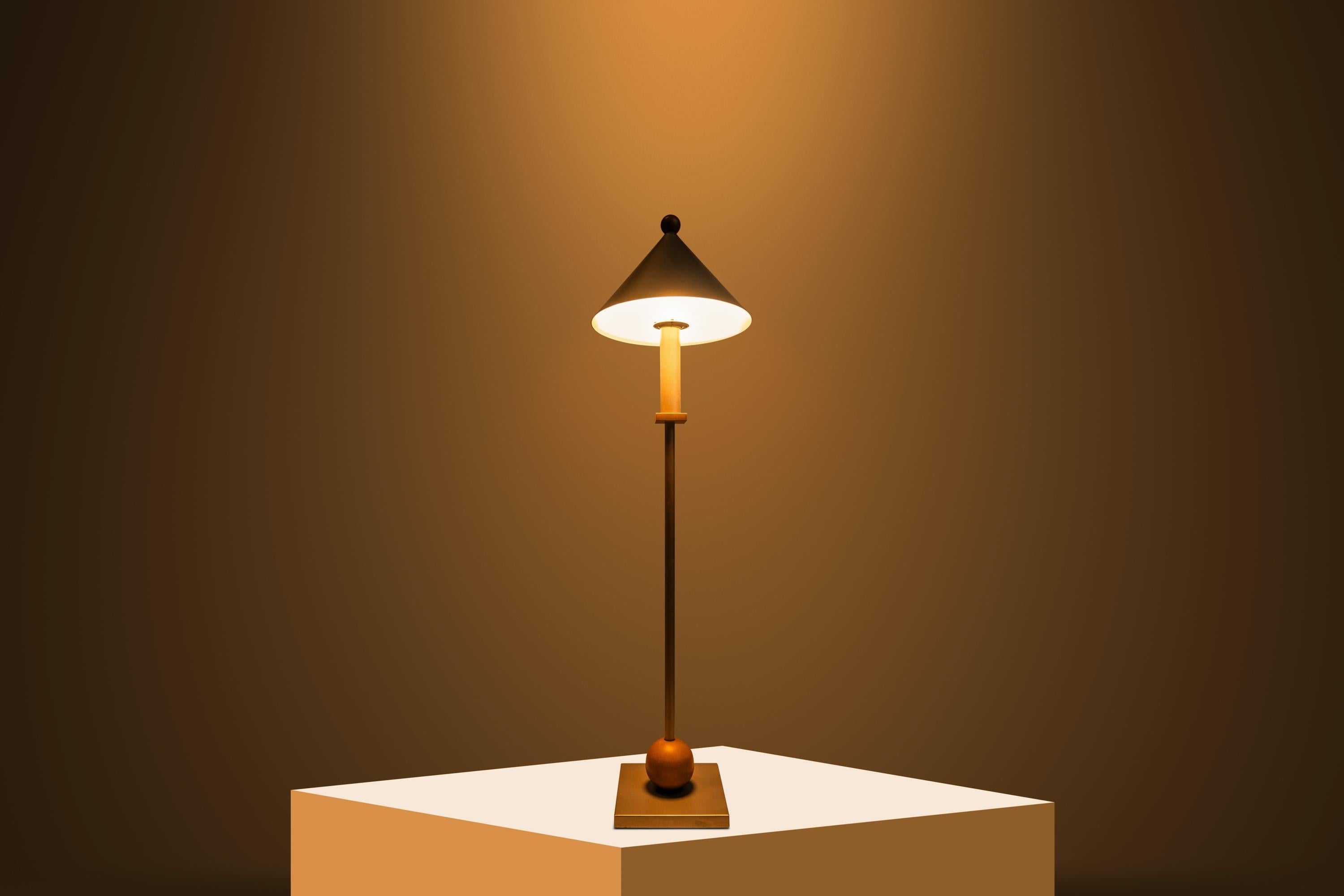 Enhance your interior with this striking Post Modern Memphis Style table lamp, designed by the renowned George Kovacs and manufactured by Sonneman in the USA during the 1990s. This distinctive lamp embodies the playful and bold aesthetic of the
