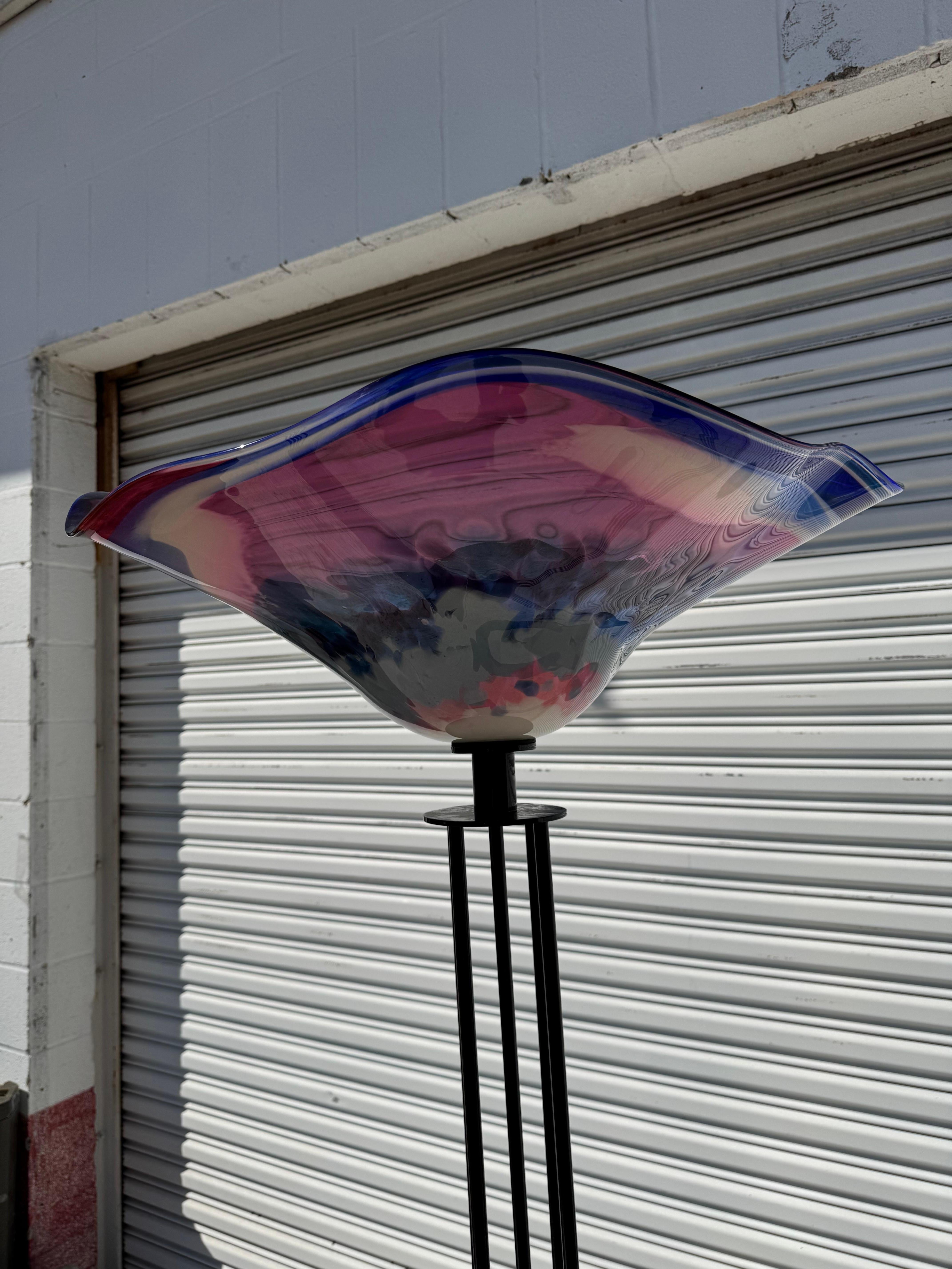 This floor lamp has a huge handblown glass shade.
The shade is 27' in diameter and 10