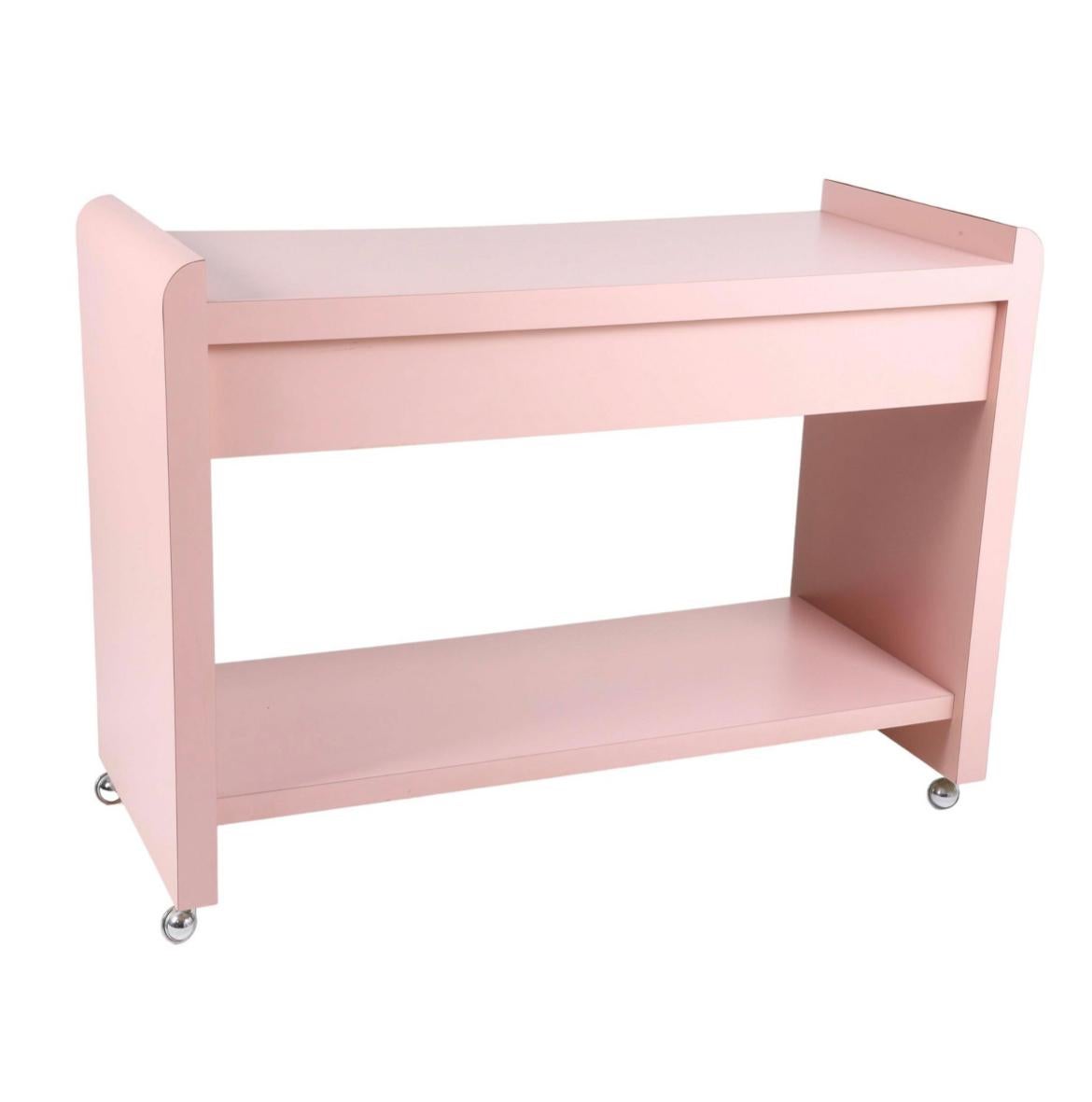 Awesome Postmodern midcentury Pink Bar Cart style of Memphis Milano. Very cool custom built unit with pink laminate with 2
mirror front drawers on chrome casters. Unique design large is Size great piece for a postmodern designed home. Made in USA,