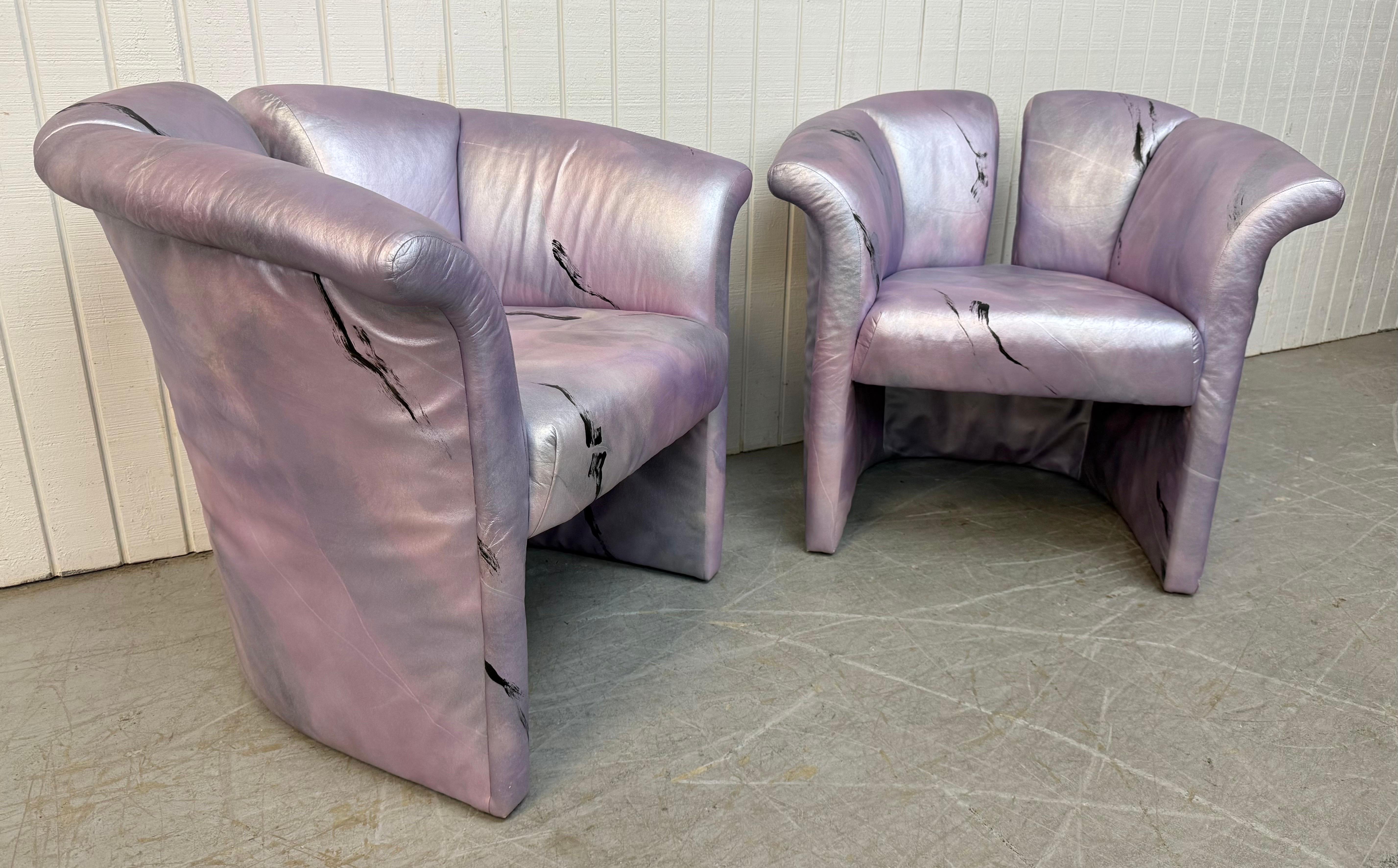 This listing is for a pair of Post Modern Split Back Arm Chairs. Featuring a Milo Baughman split back style design, rounded arms, and original abstract vinyl upholstery. This is an exceptional combination of quality and post modern design! 