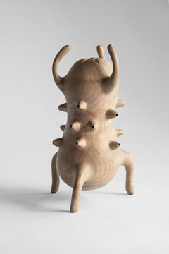 Atang Tshikare, monolith, chairs and side table and sculpture