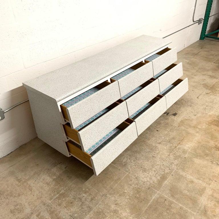 Post Modern Nine Drawer Dresser Chest of Drawers Granite and White Mica Laminate In Good Condition For Sale In Miami, FL